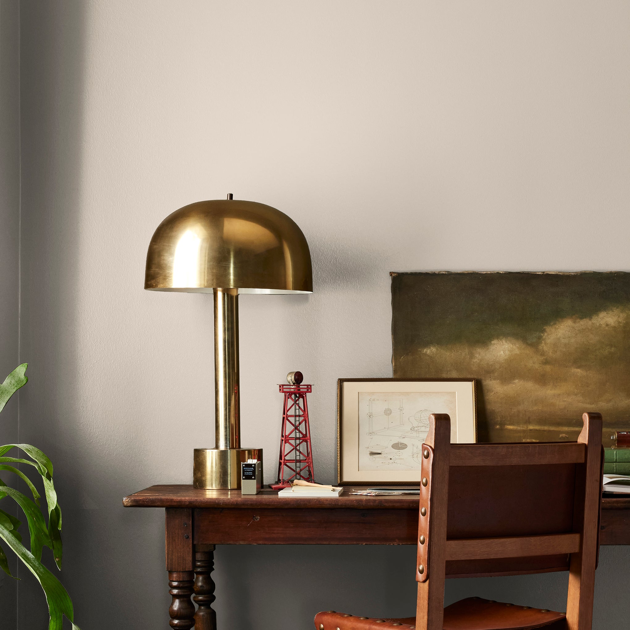A light warm beige Interior Paint named plaster shown painted on bedroom wall