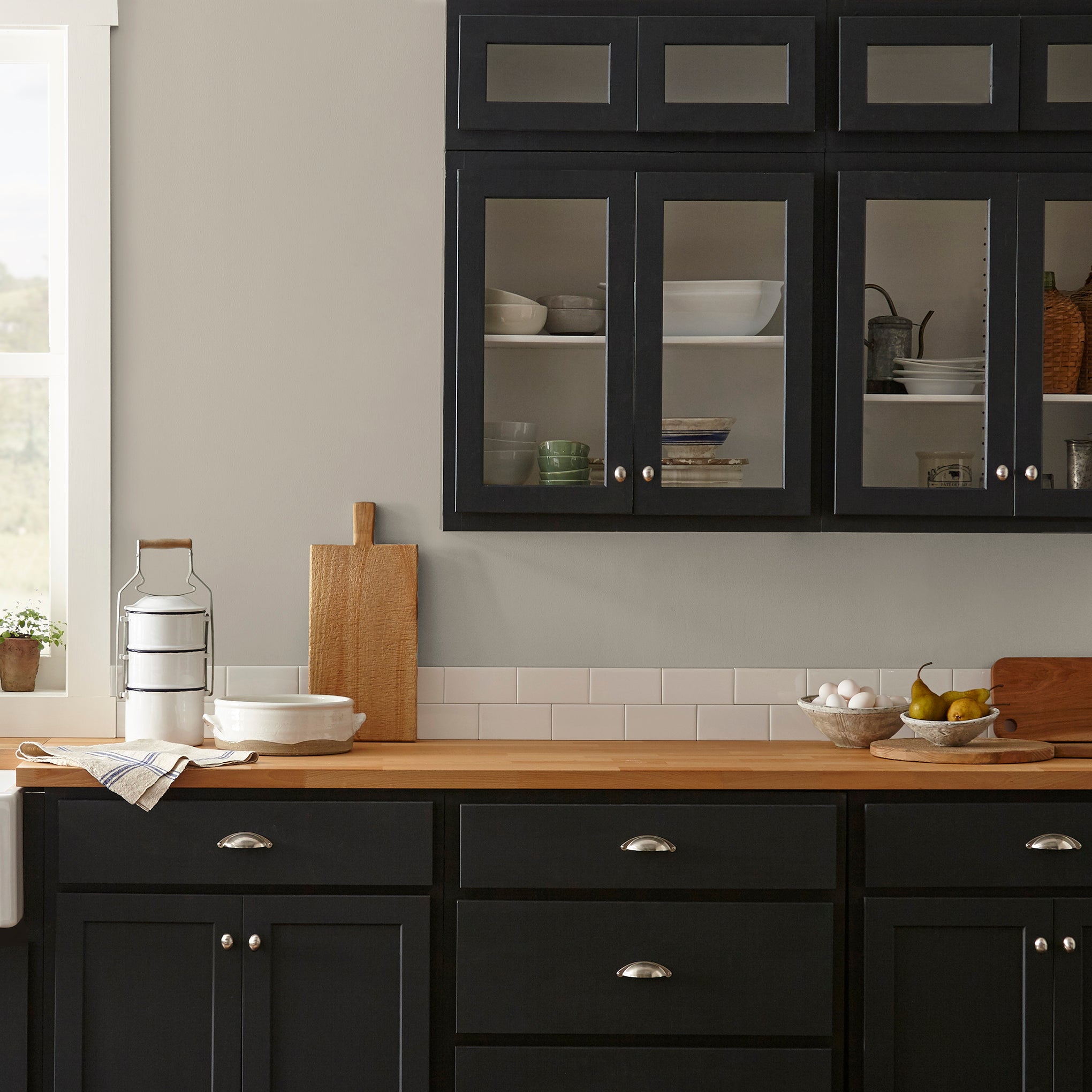 Soft french gray interior paint named Drawing Room shown painted on kitchen wall