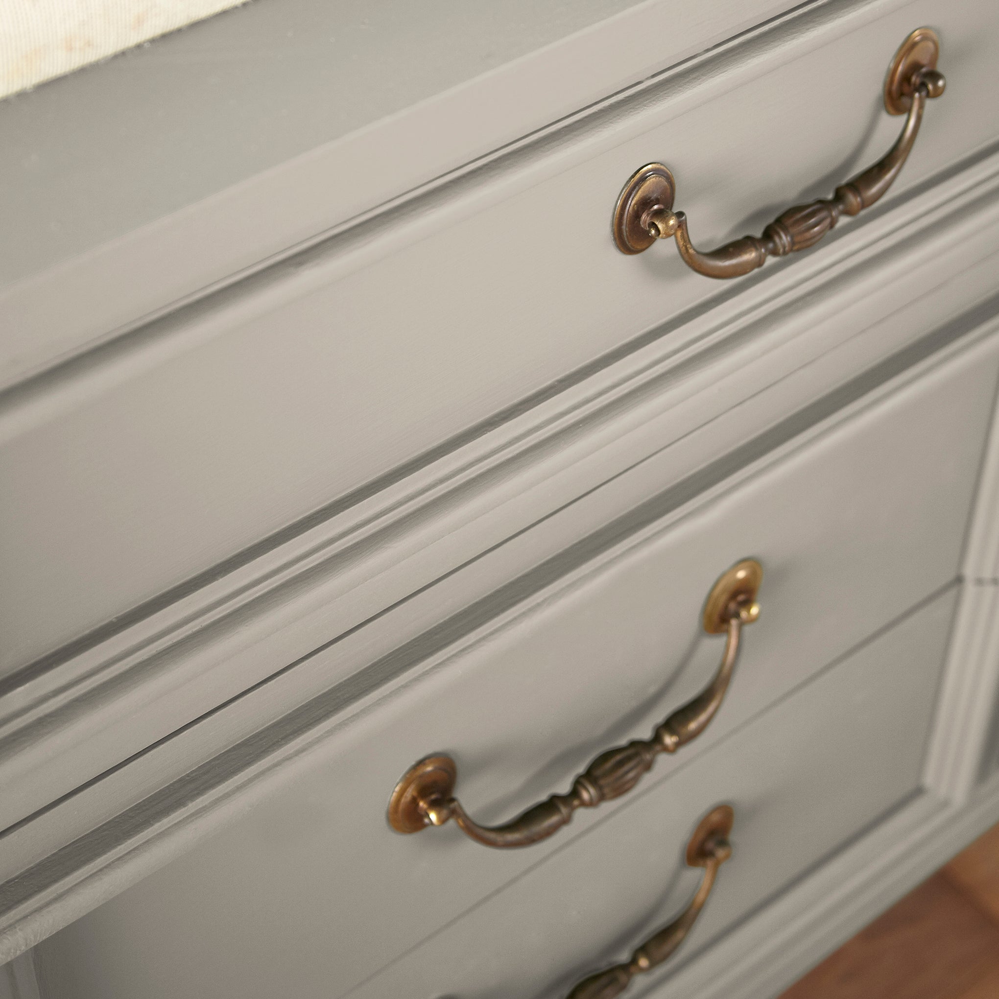 A soft French gray door and cabinet paint named drawing room shown painted on cabinet