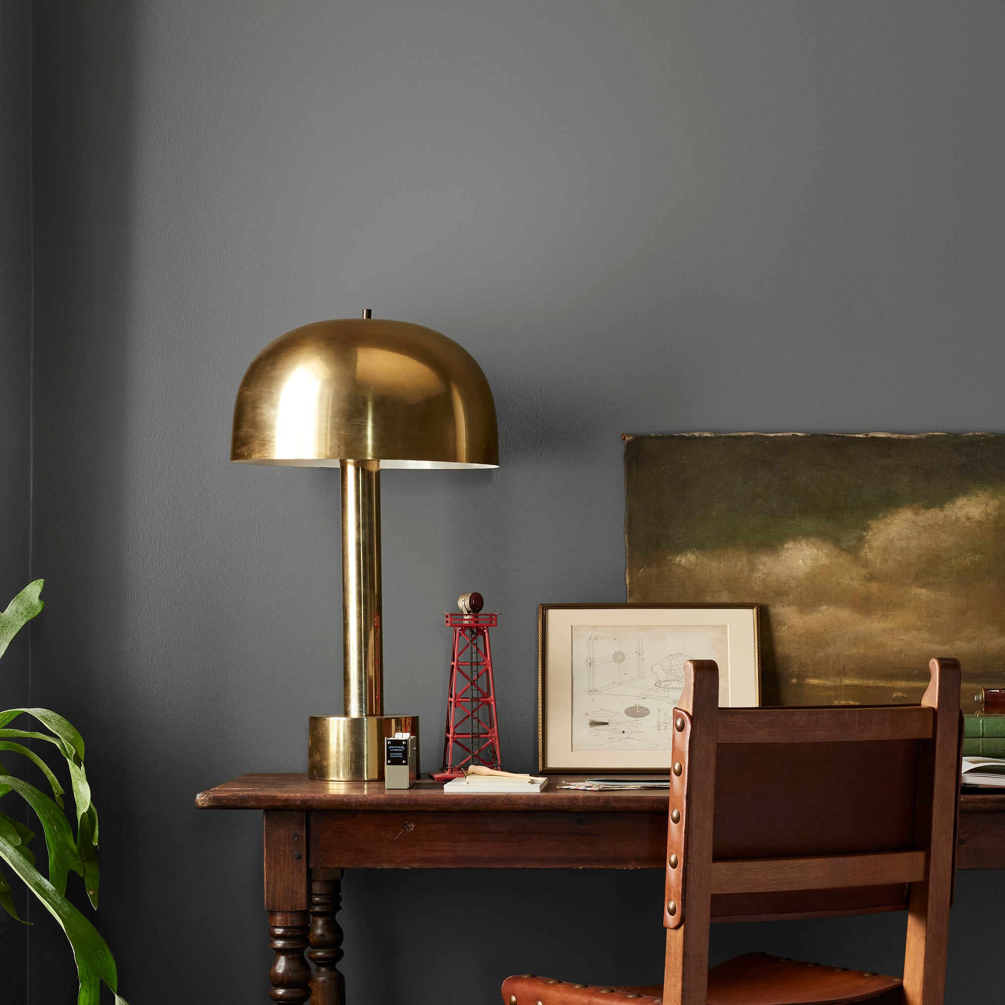 rich charcoal gray interior paint named Conservatory shown on bedroom wall