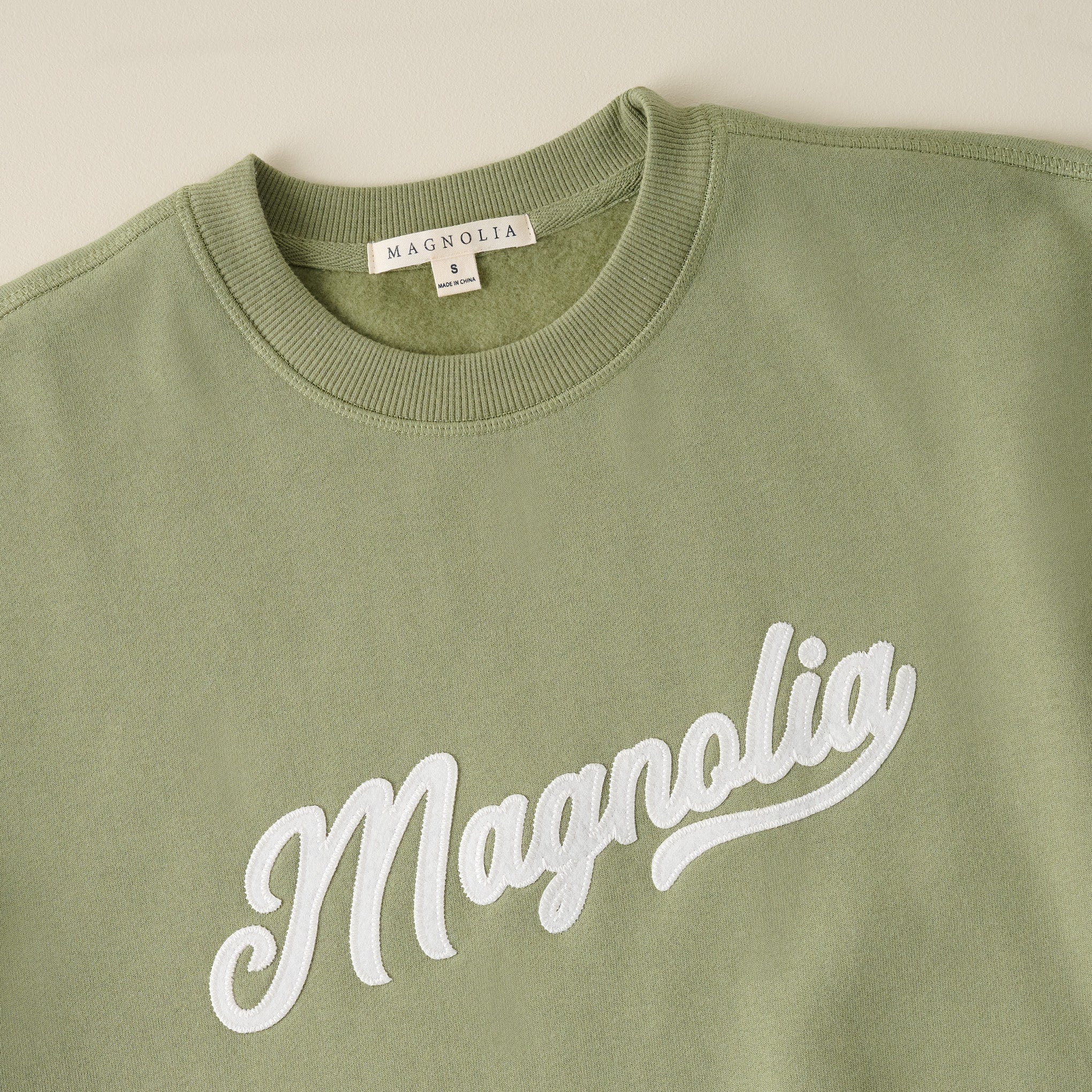 Magnoliass Script Green Felt Applique Sweatshirt close up