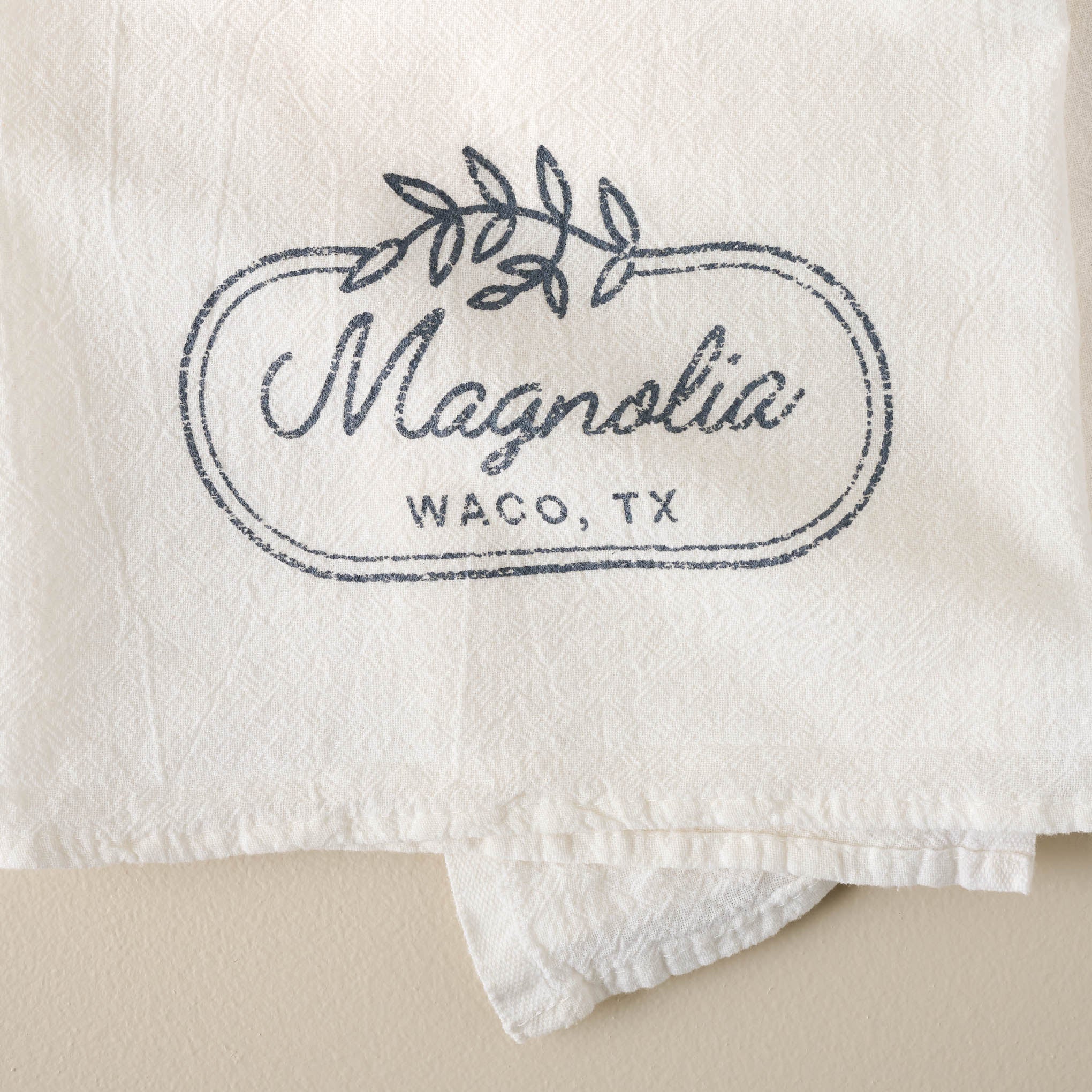 Magnoliass Laurel Leaf Border Tea Towel close up