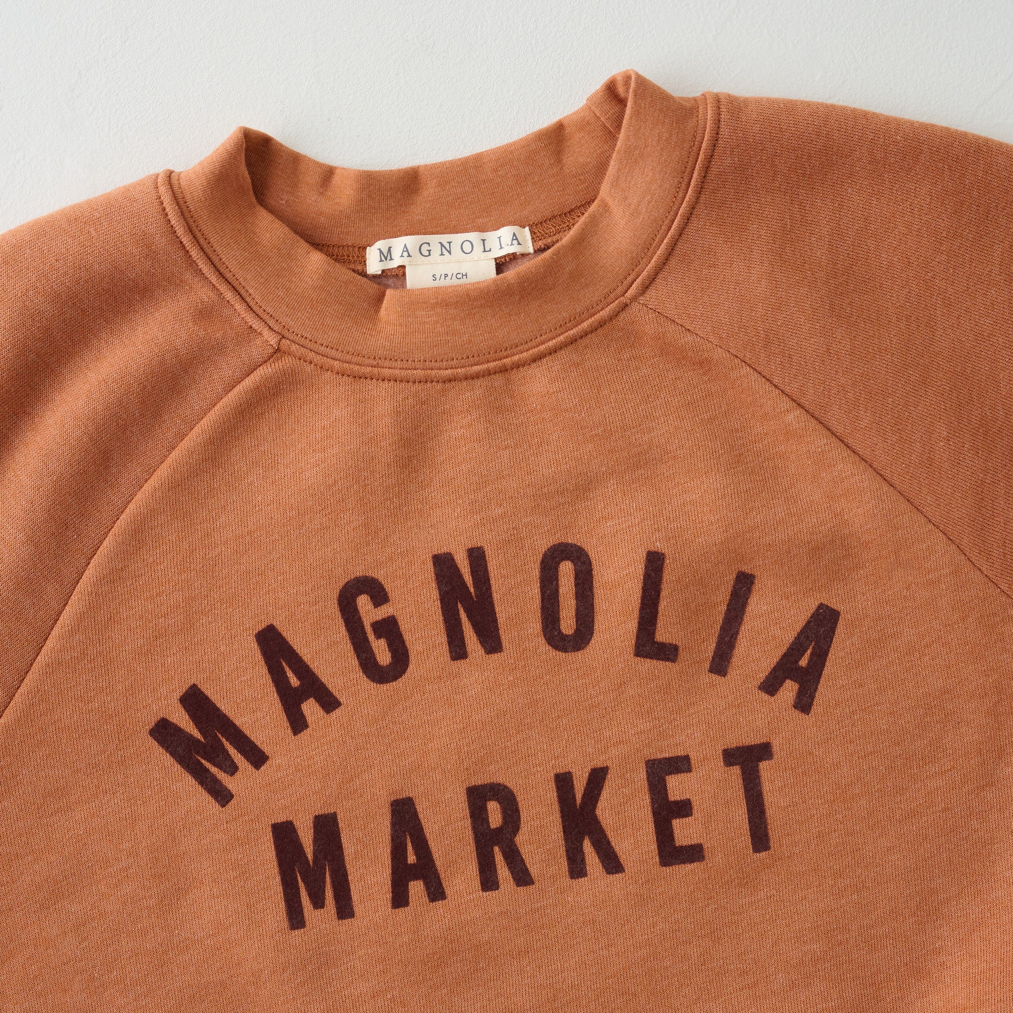 Magnoliass Market Terracotta Sweatshirt up close