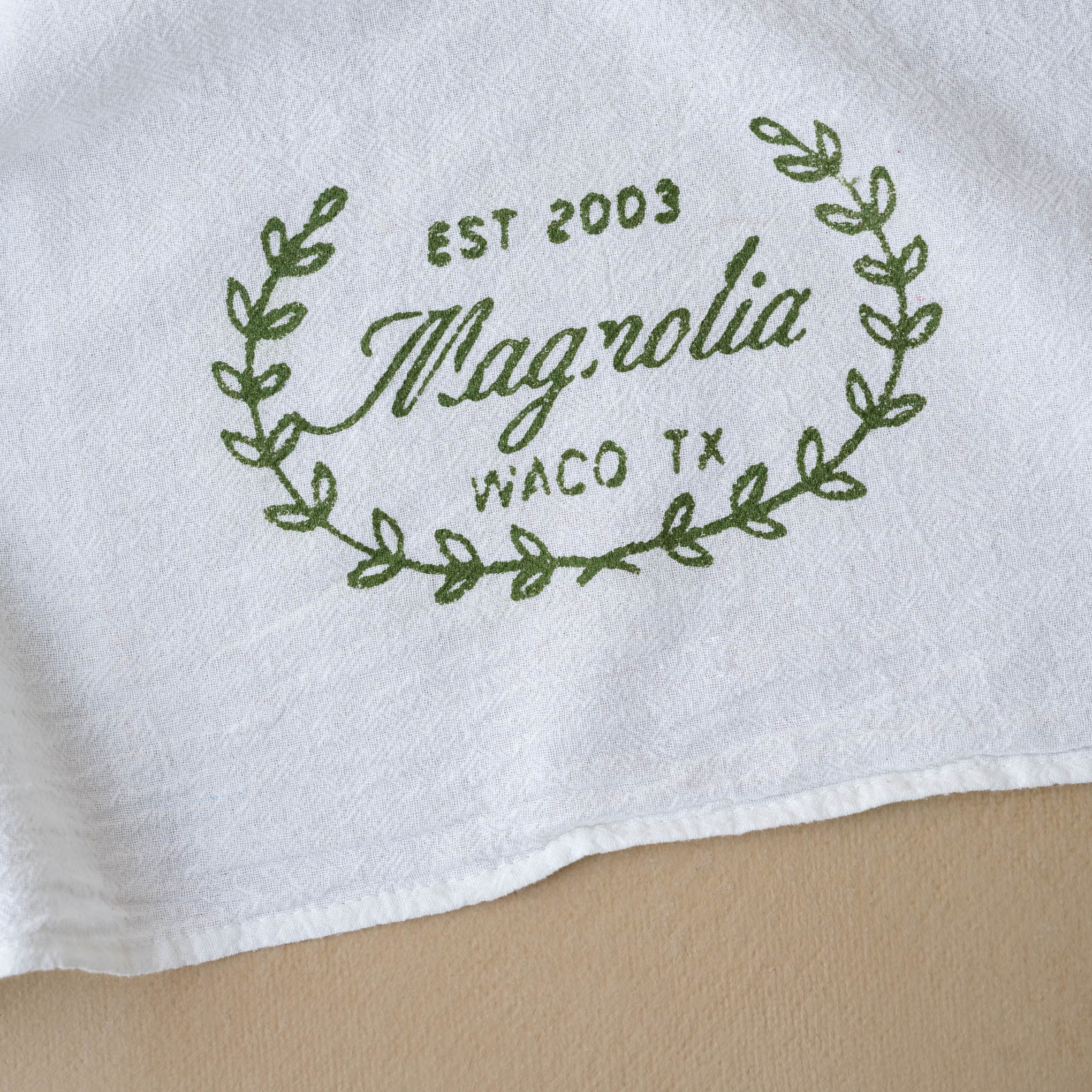 Magnoliass Sage Laurel Wreath Tea Towel close up of design 