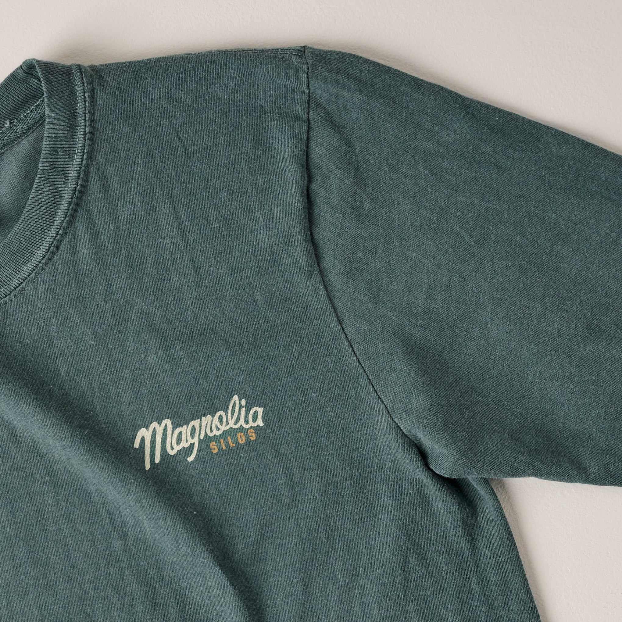 Front of Magnoliass Script Silos Blue Spruce Long Sleeve Shirt close up