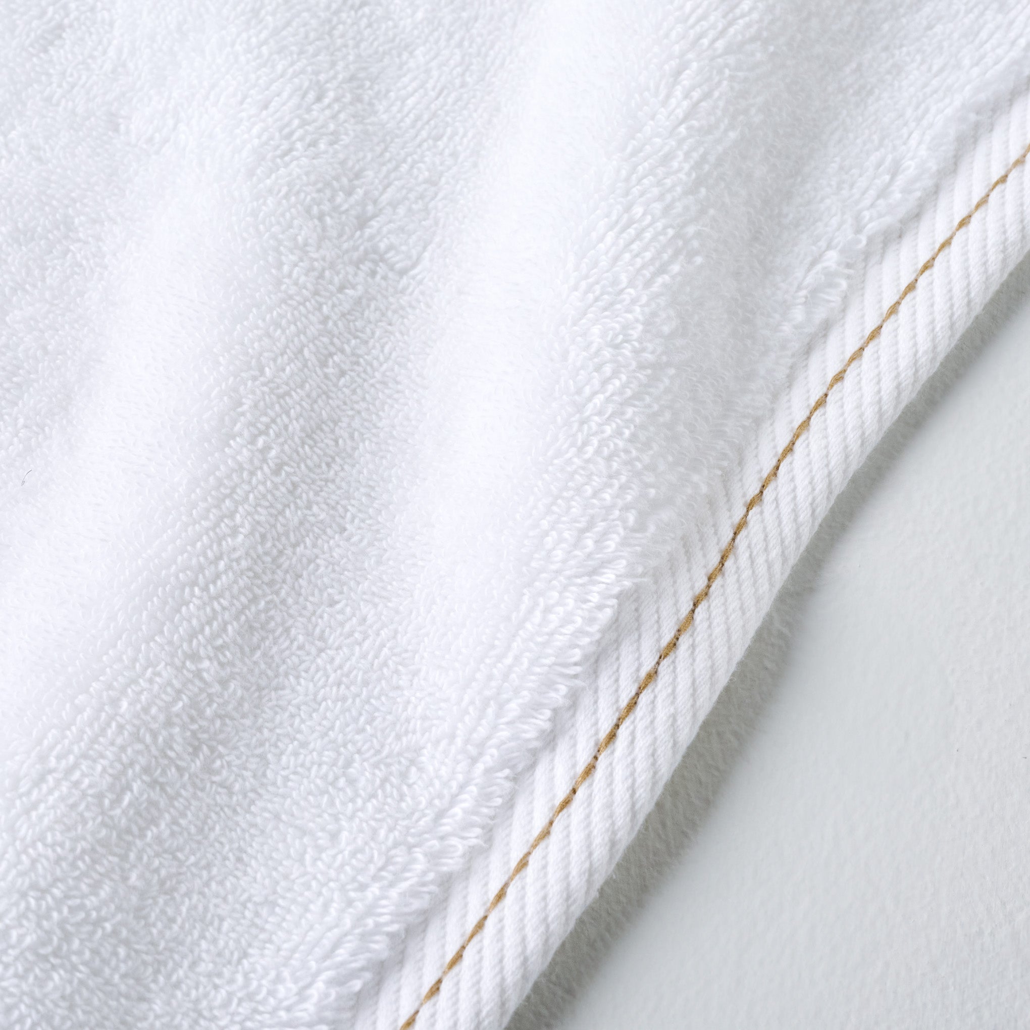 Magnoliass White Plush Stitched Edge Towel up close