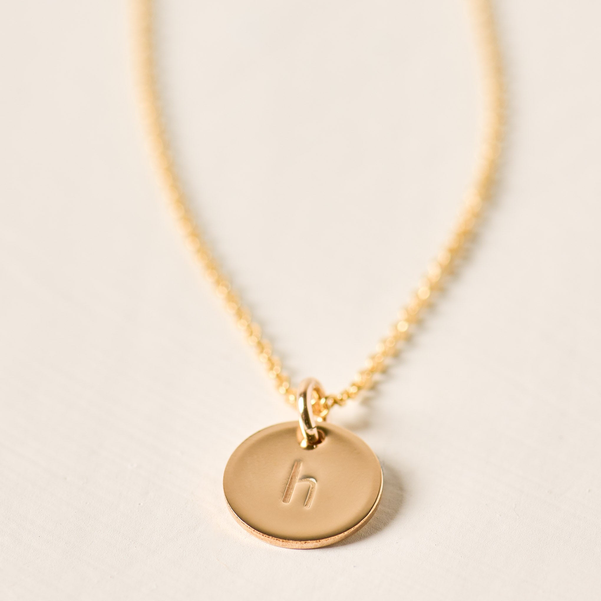 Magnoliass gold initial disc necklace