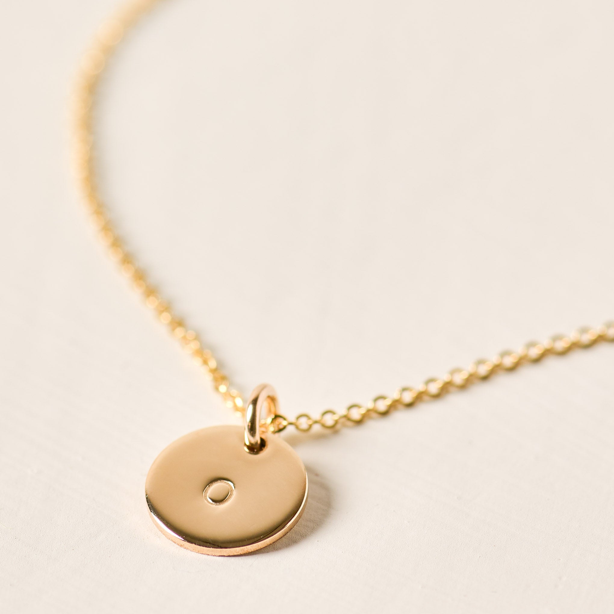 Magnoliass gold initial disc necklace