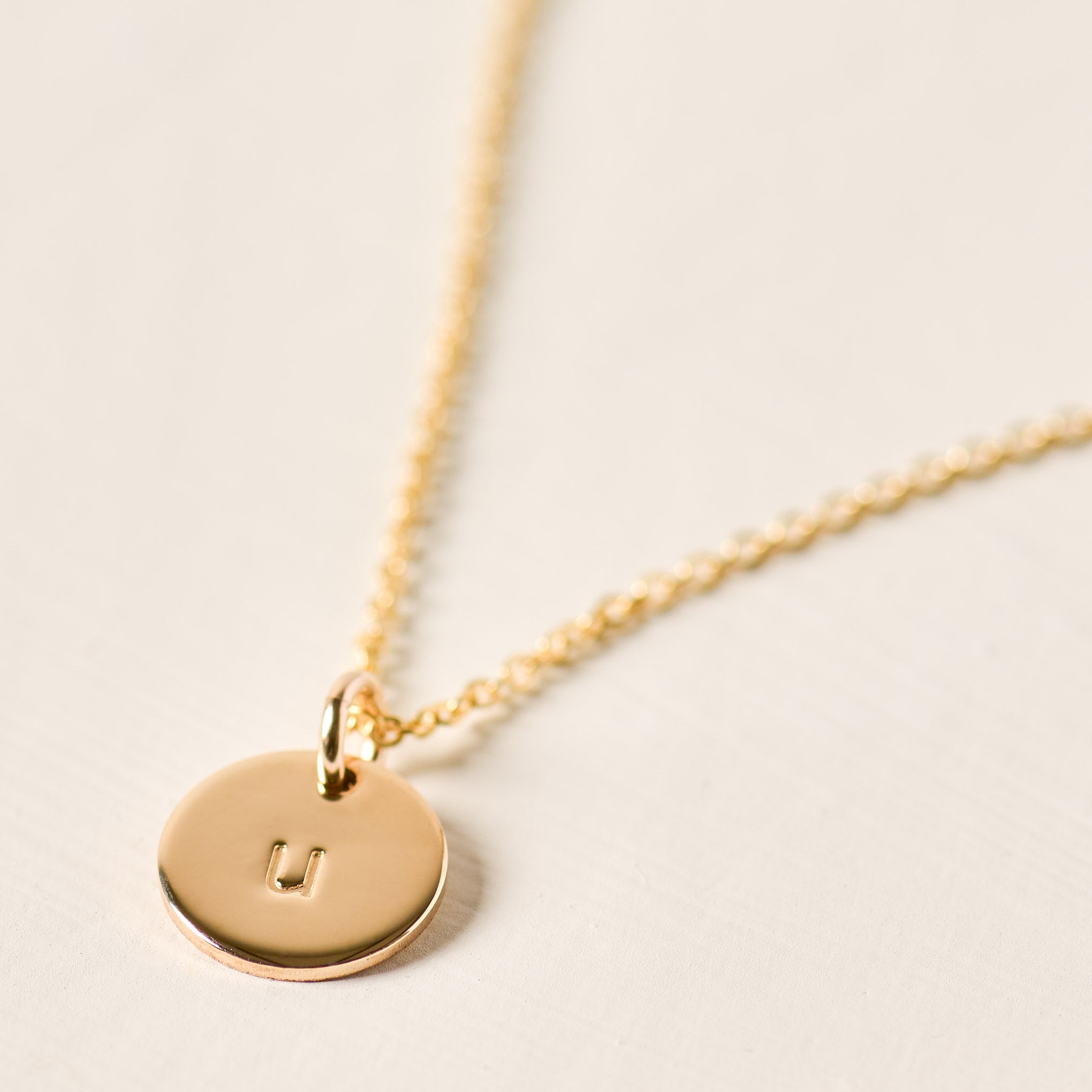 Magnoliass gold initial disc necklace