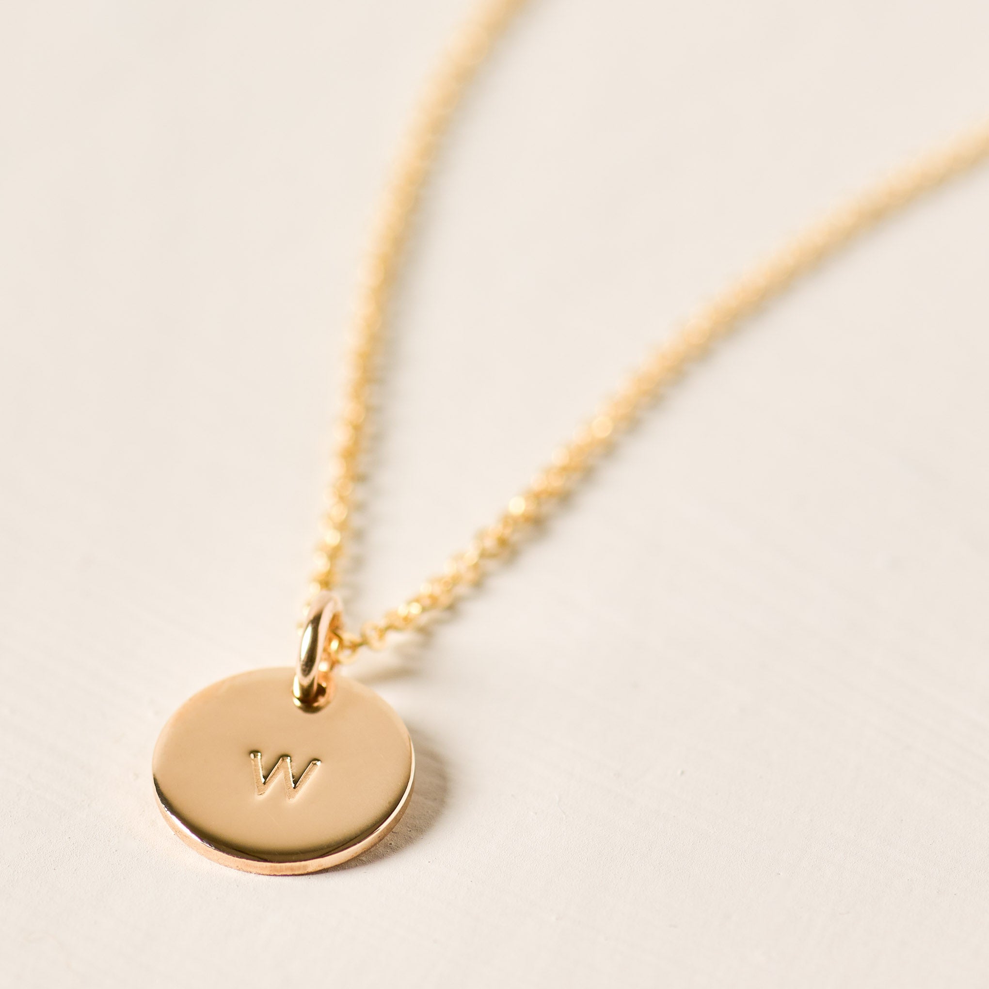Magnoliass gold initial disc necklace