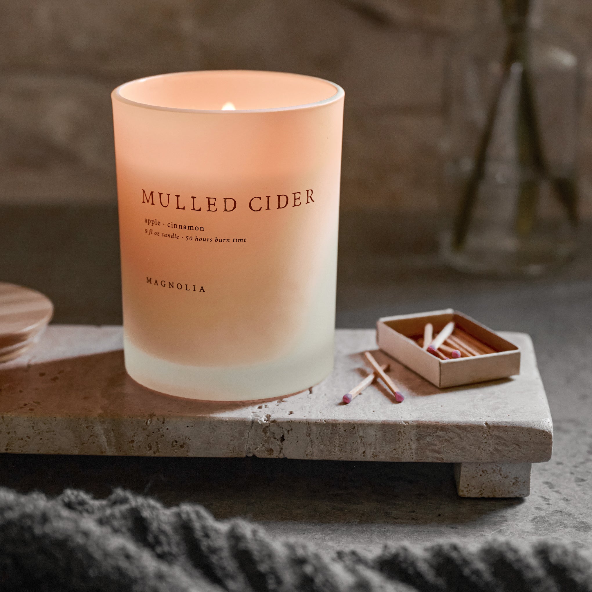 9oz Magnoliass Mulled Cider Candle lit