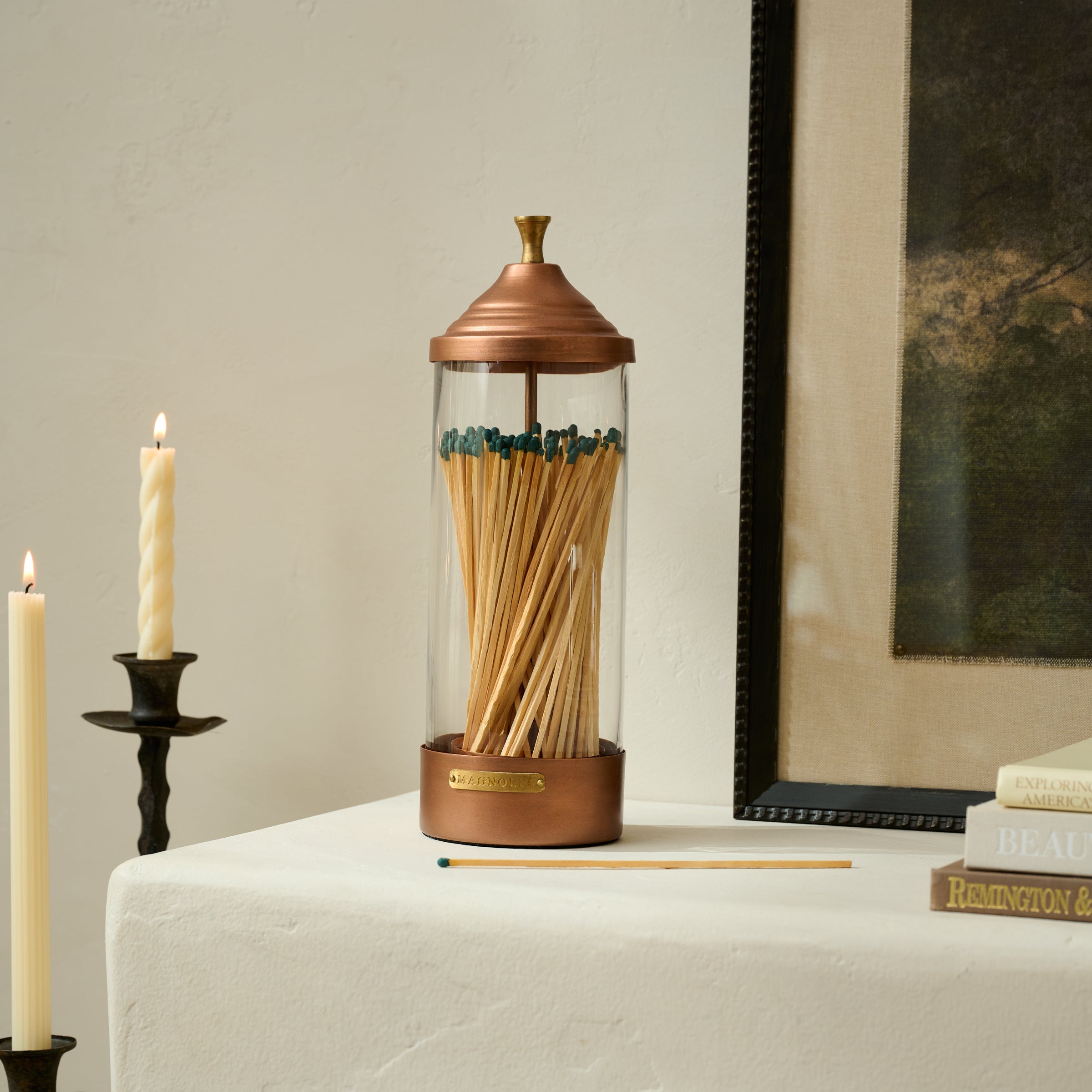Magnoliass Copper Fireplace Matchsticks shown on mantel