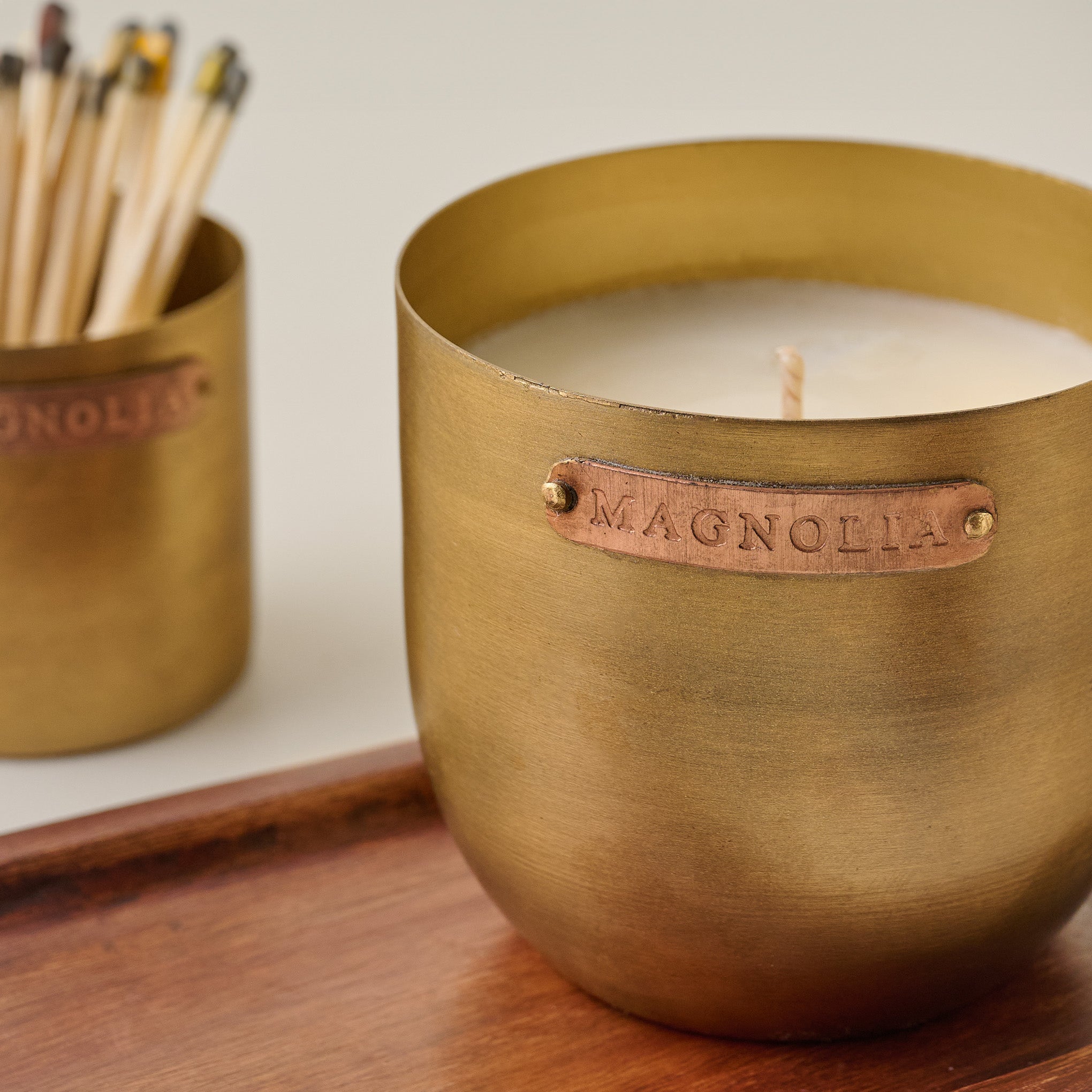 Magnoliass Santalum Brass and Copper Candle Set up close
