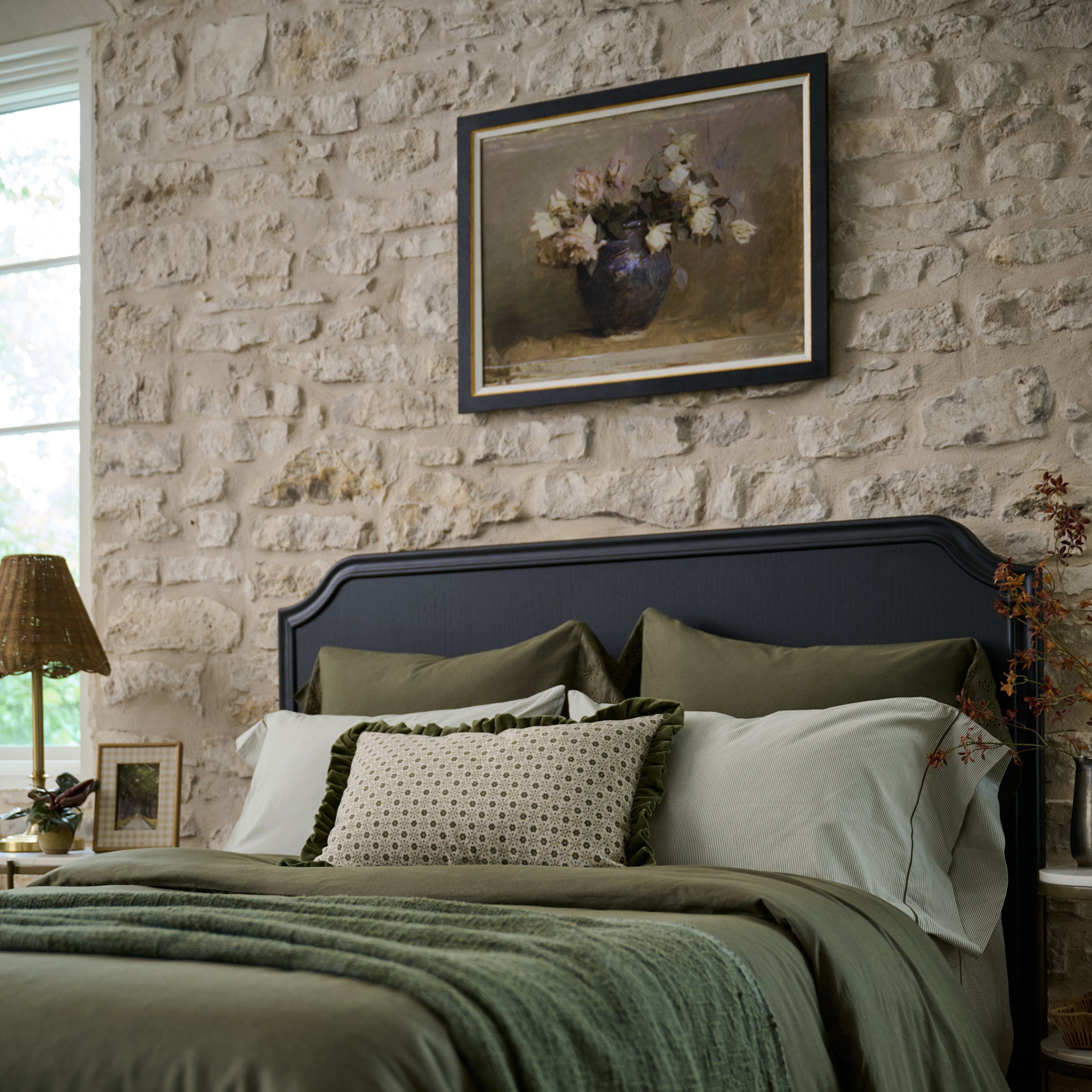 Collected Roses above a bed