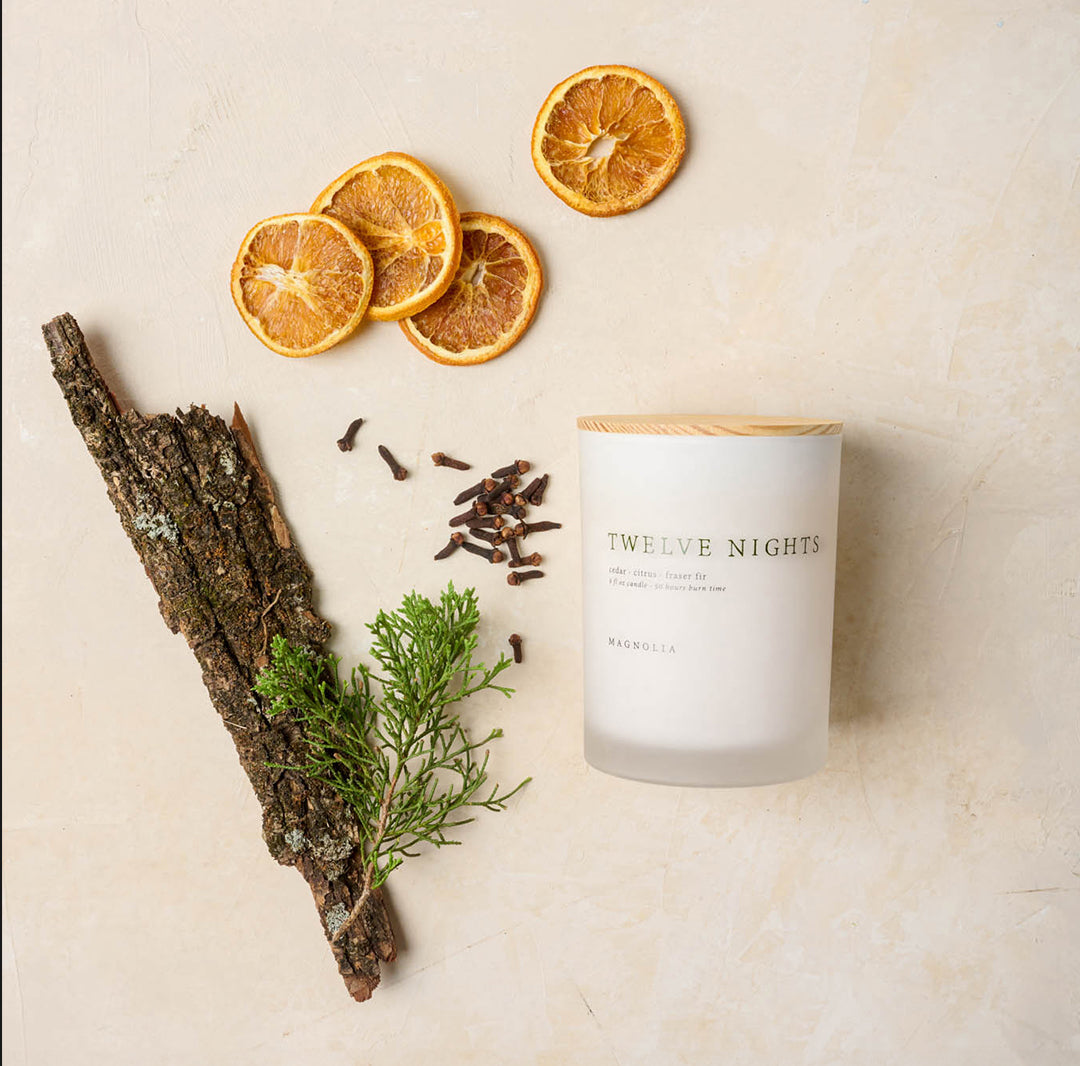 Magnoliass twelve nights candle scent profile shows cedar citrus and fraser fir