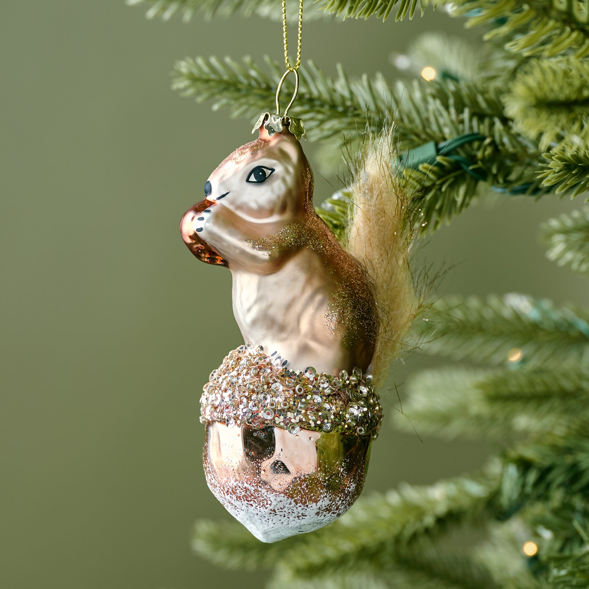 Splendid Squirrel Ornament shown on tree