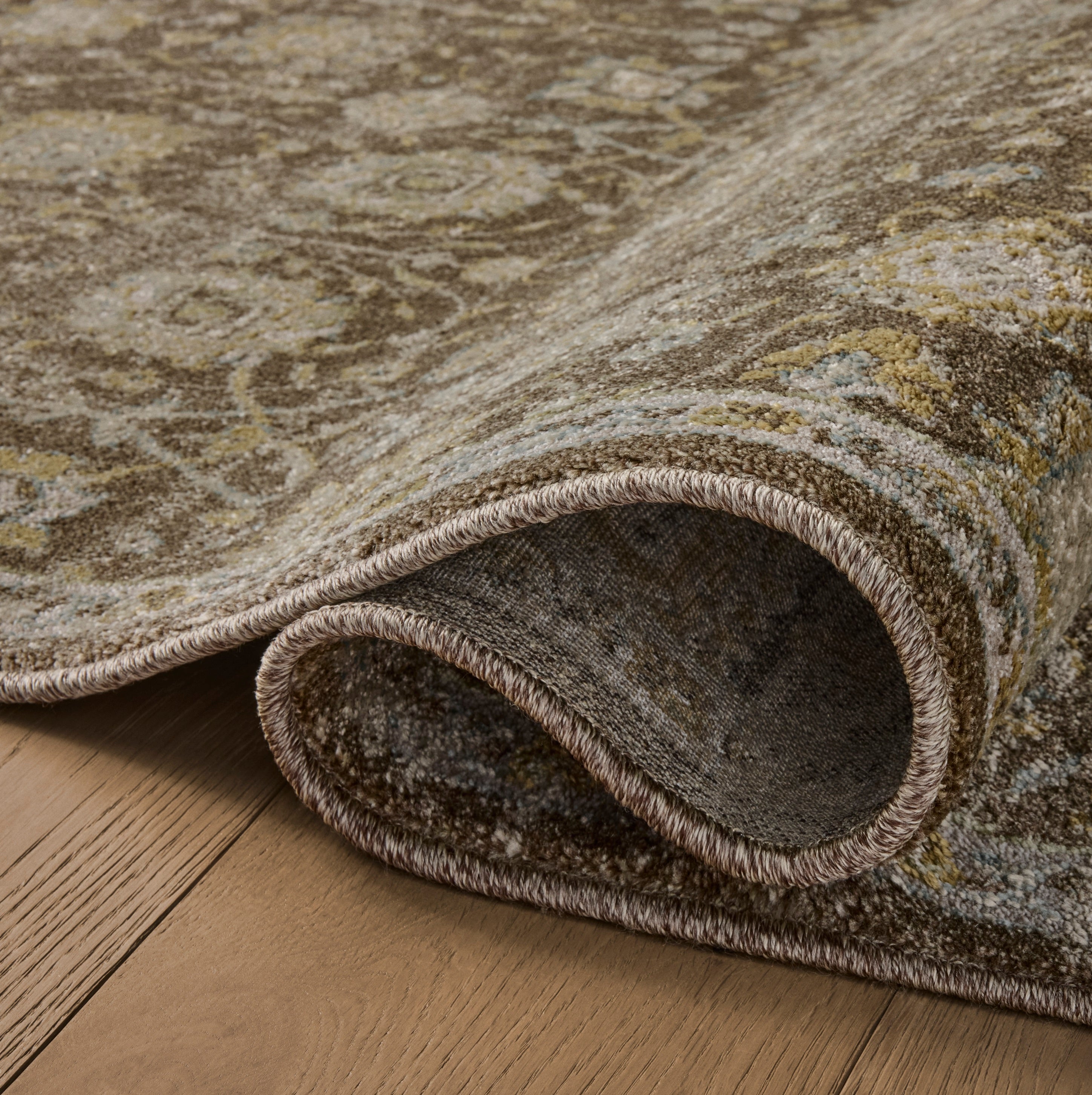 Mona Bark Natural Rug close up of rolled rug