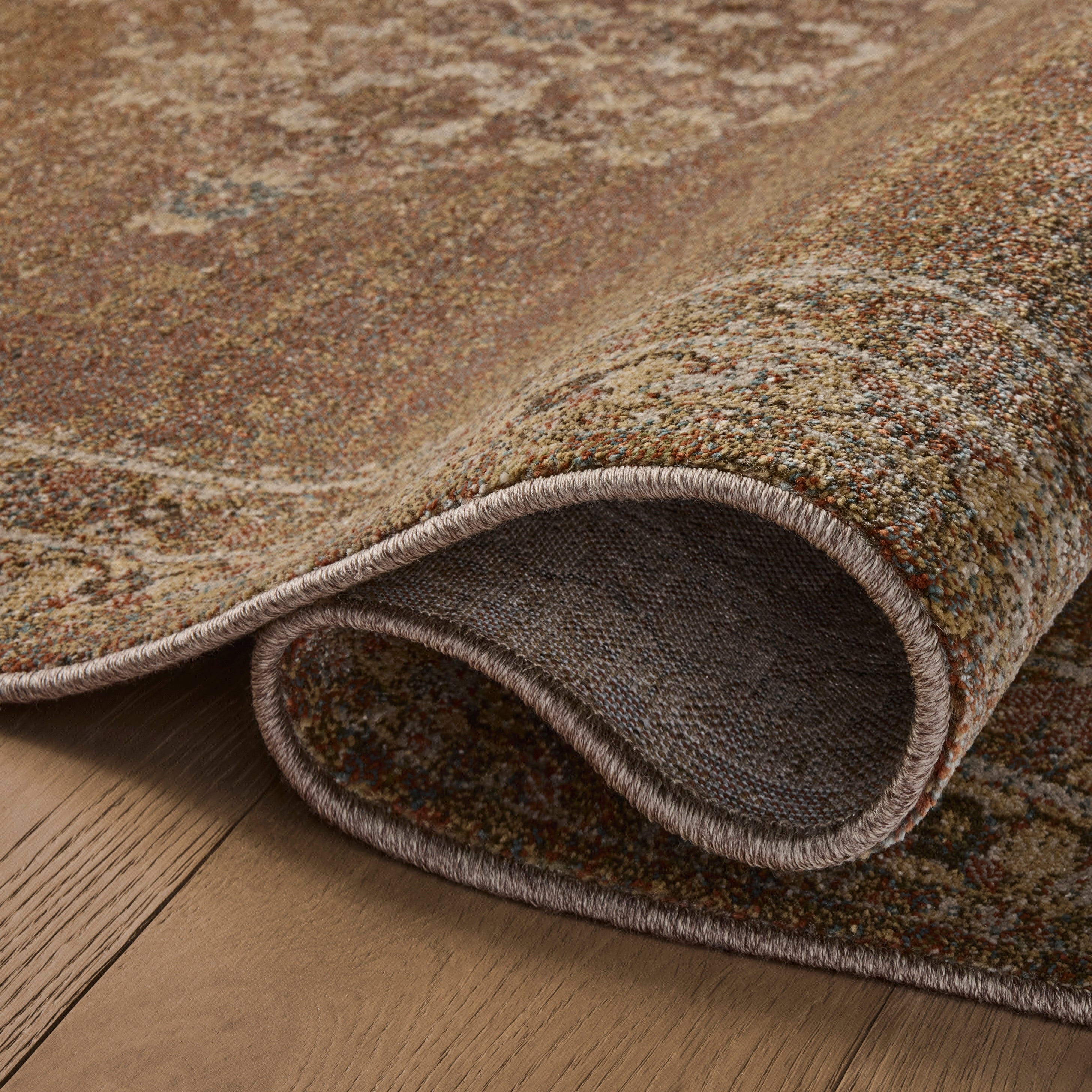 Mona Sunset Natural Rug close up of rolled rug