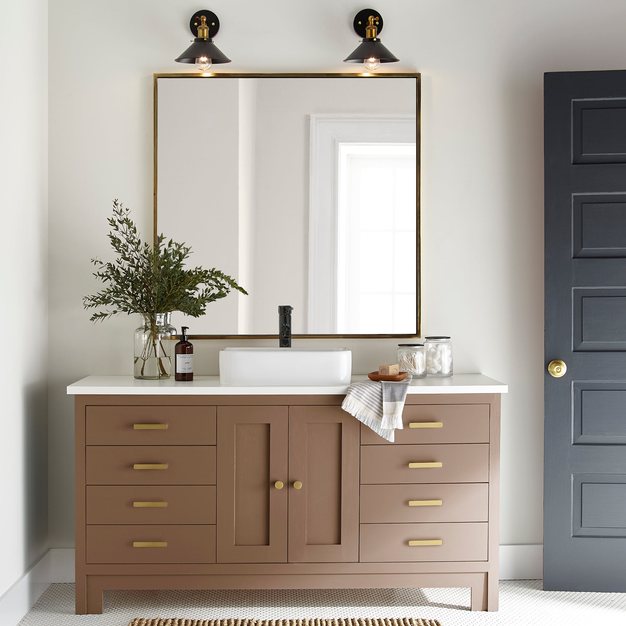 earthy brown with reddish hue paint color named cognac shown painted on bathroom cabinets