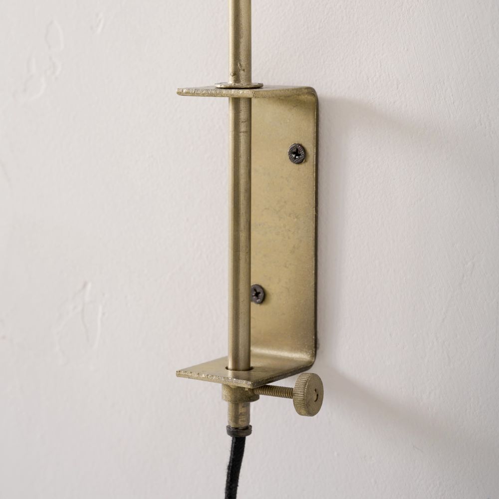 Sybil Ceramic Plug-in Sconce close up of wall attachment