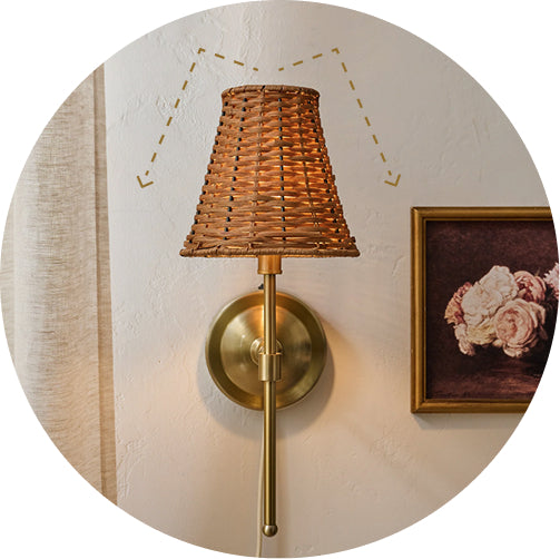 Wall sconce with woven shade and brass base
