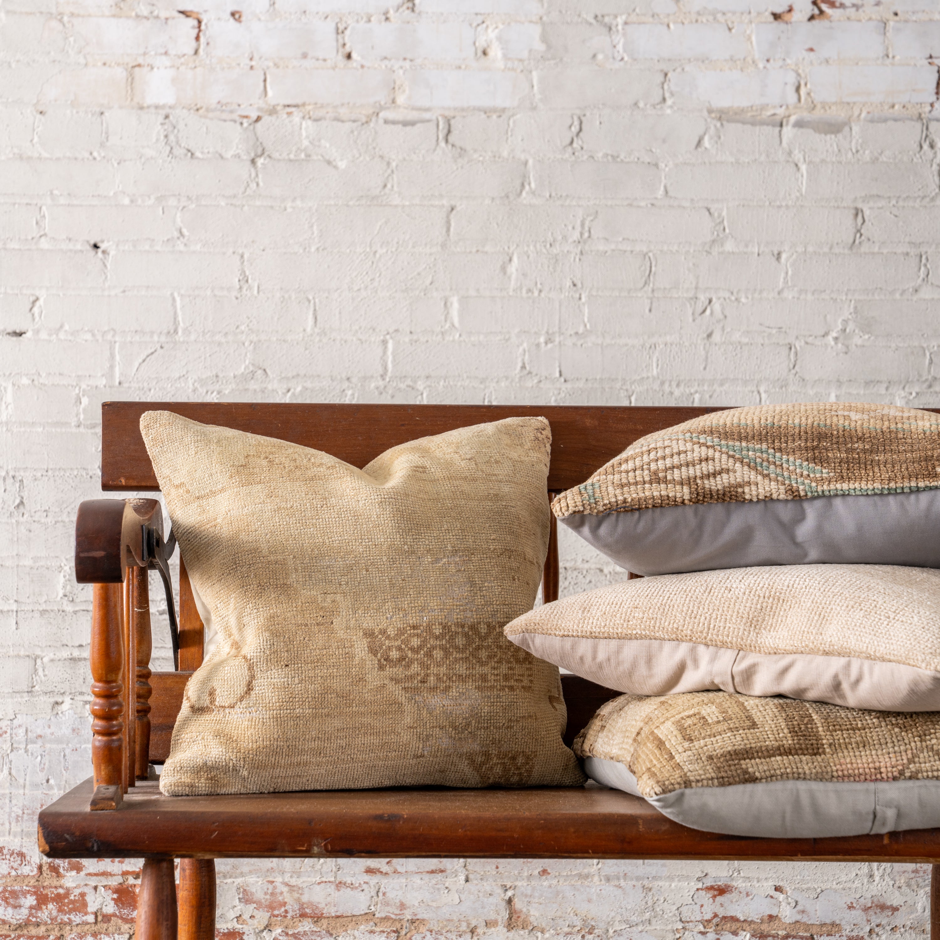 Vintage OAK Hand-Knotted Pillows on bench