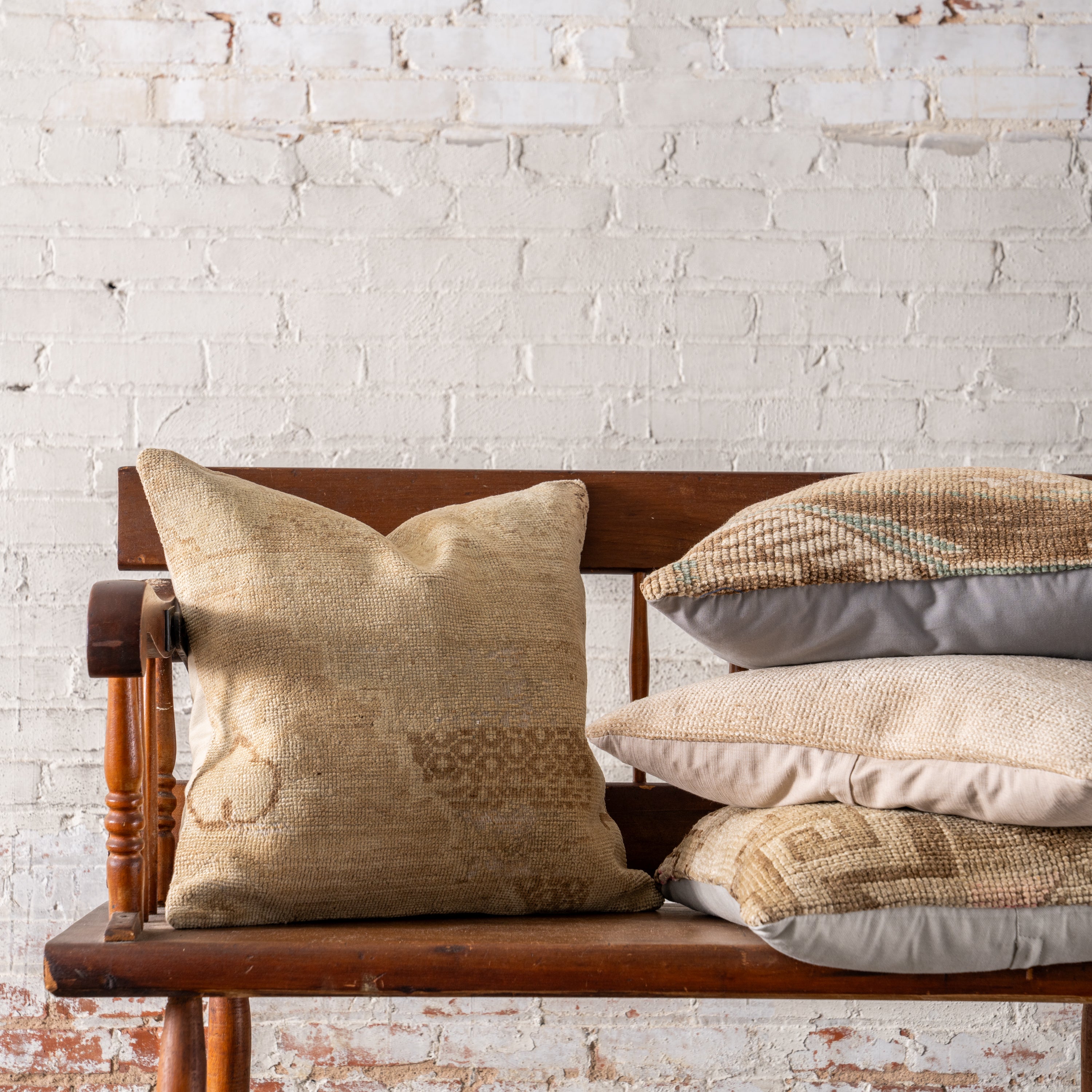 Vintage OAK Hand-Knotted Pillows on bench