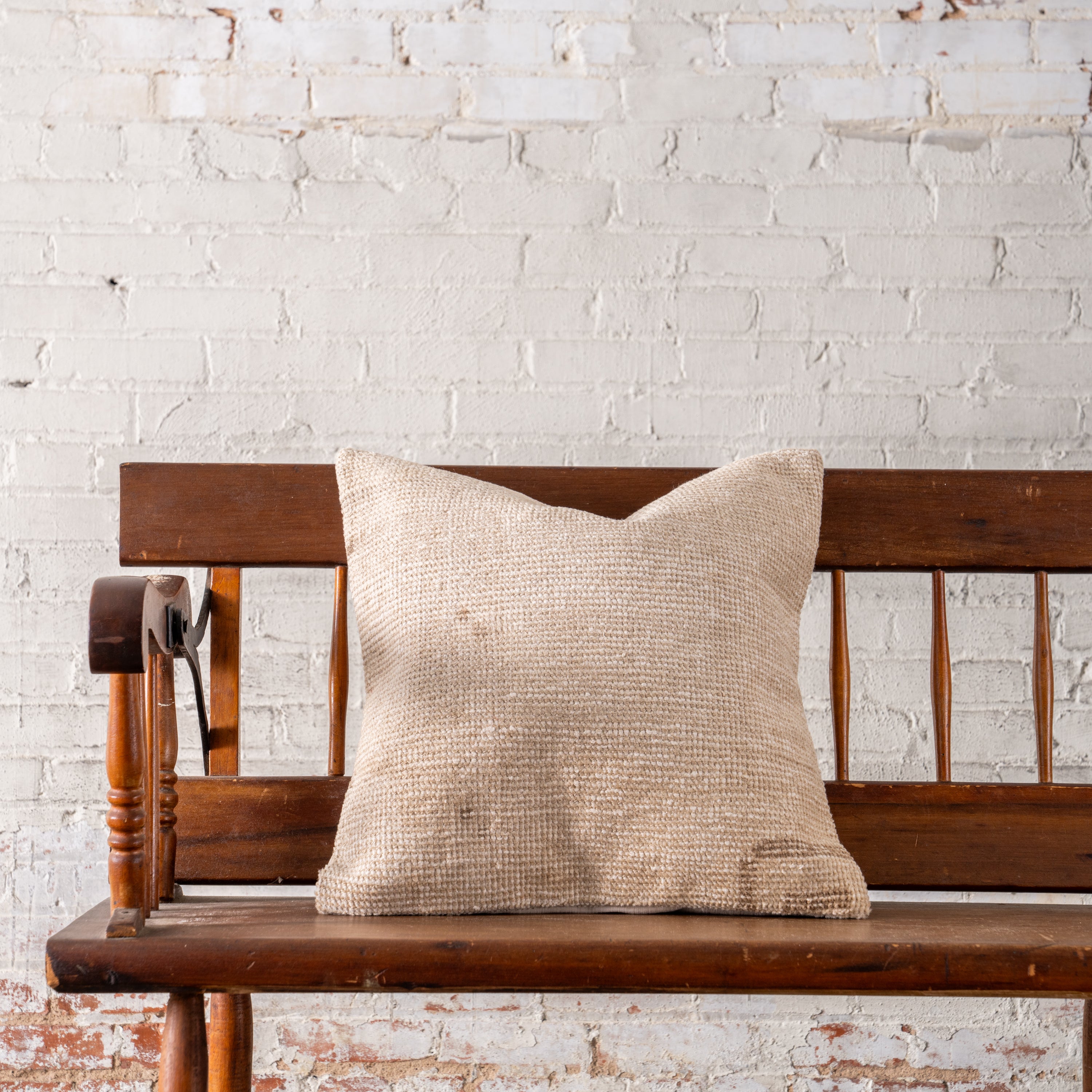 Vintage OAK Hand-Knotted Pillow on bench
