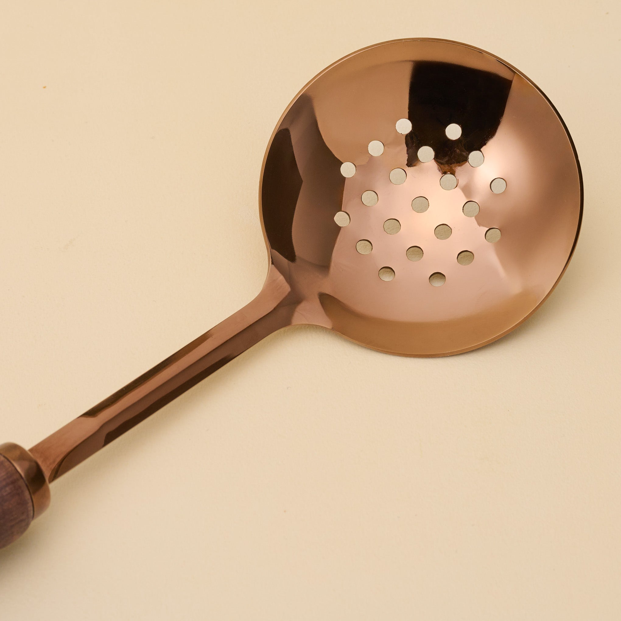 Walnut Handle + Copper Slotted Spoon close up