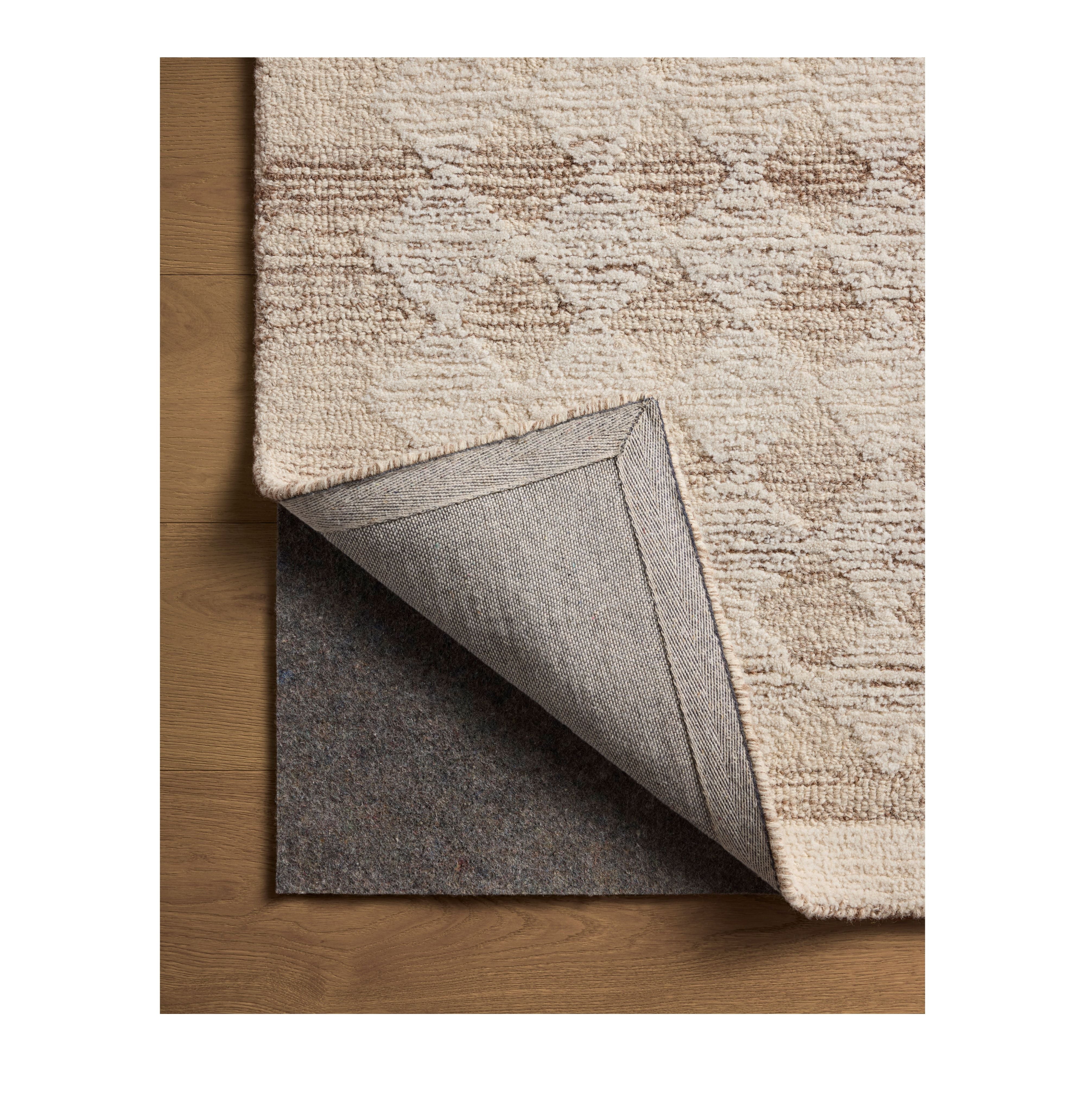 Rae Natural Ivory Rug corner flipped back