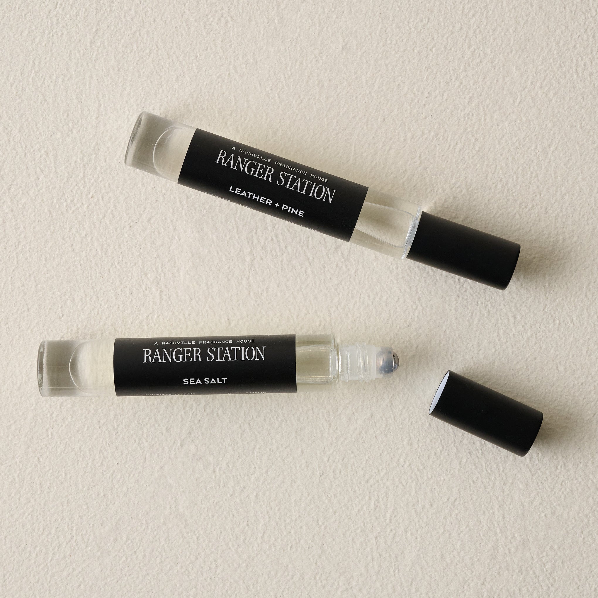 Ranger Station 10ML Leather and Pine Cologne shown with Sea Salt Cologne