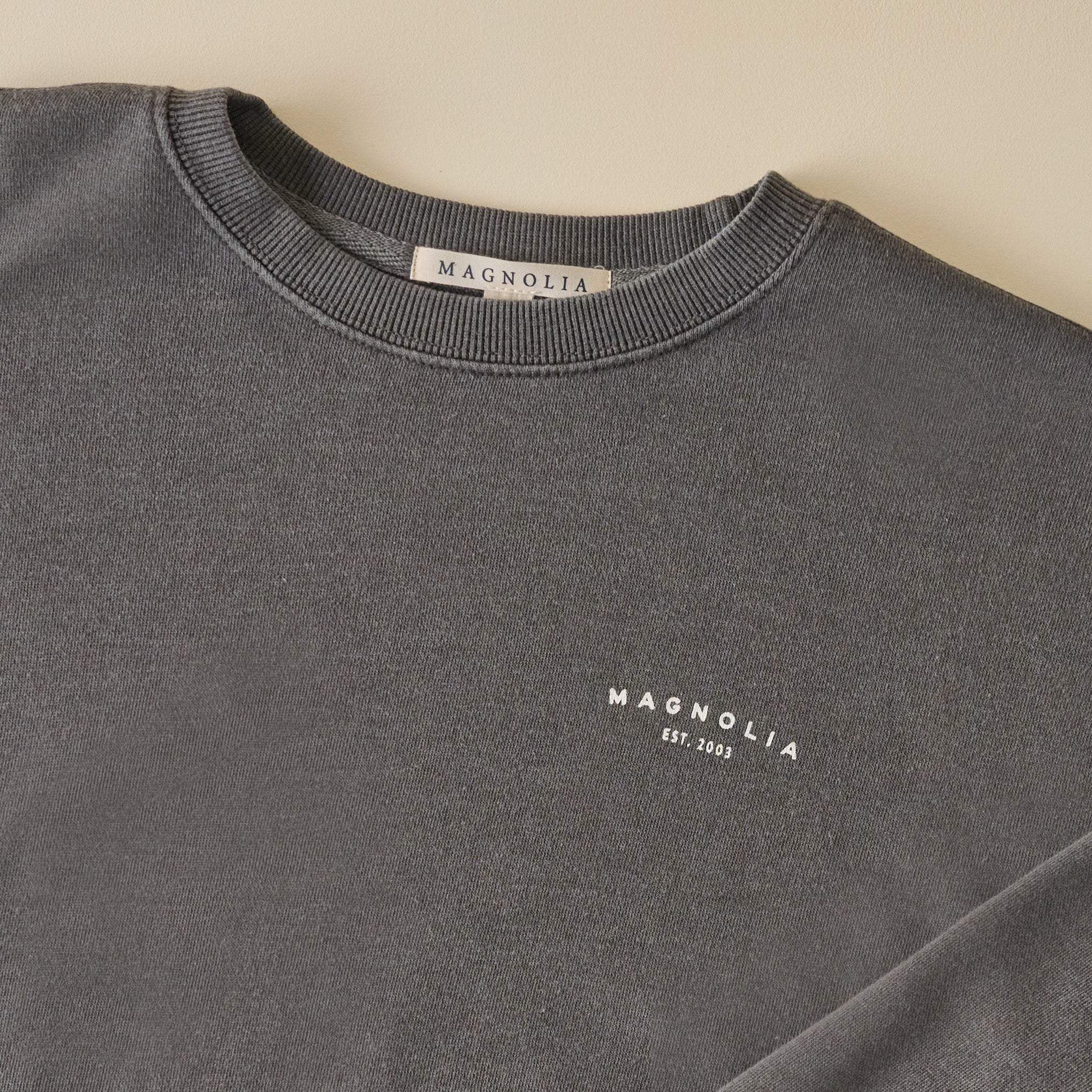 Magnoliass Silos Garment Dye Washed Black Sweatshirt front graphic up close
