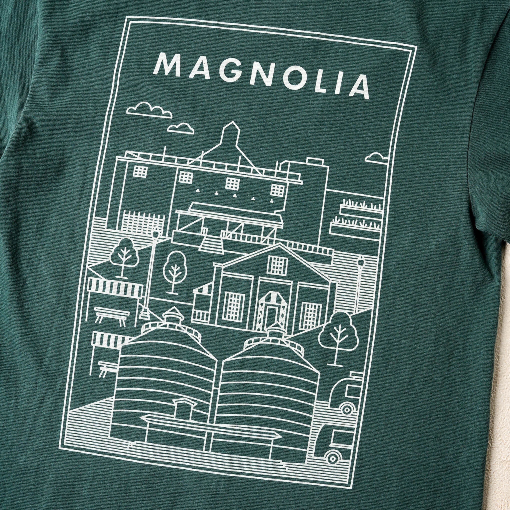 Magnoliass Silos Icons Blue Spruce Shirt close up of logo on back of shirt