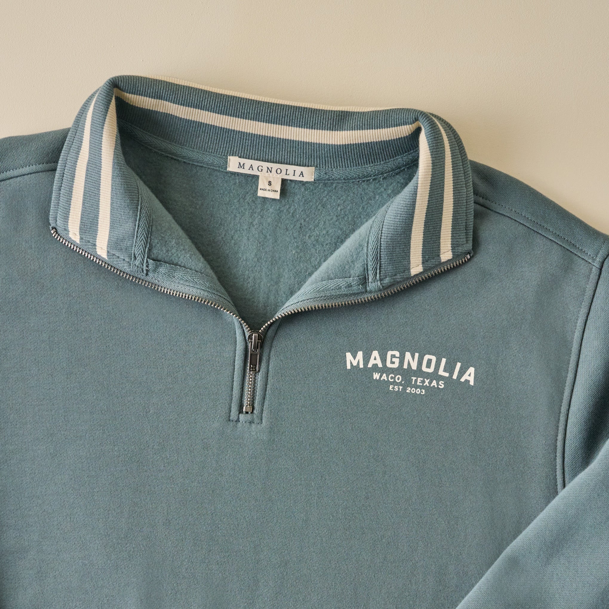 Magnoliass Silos Storm Grey Quarter Zip up close