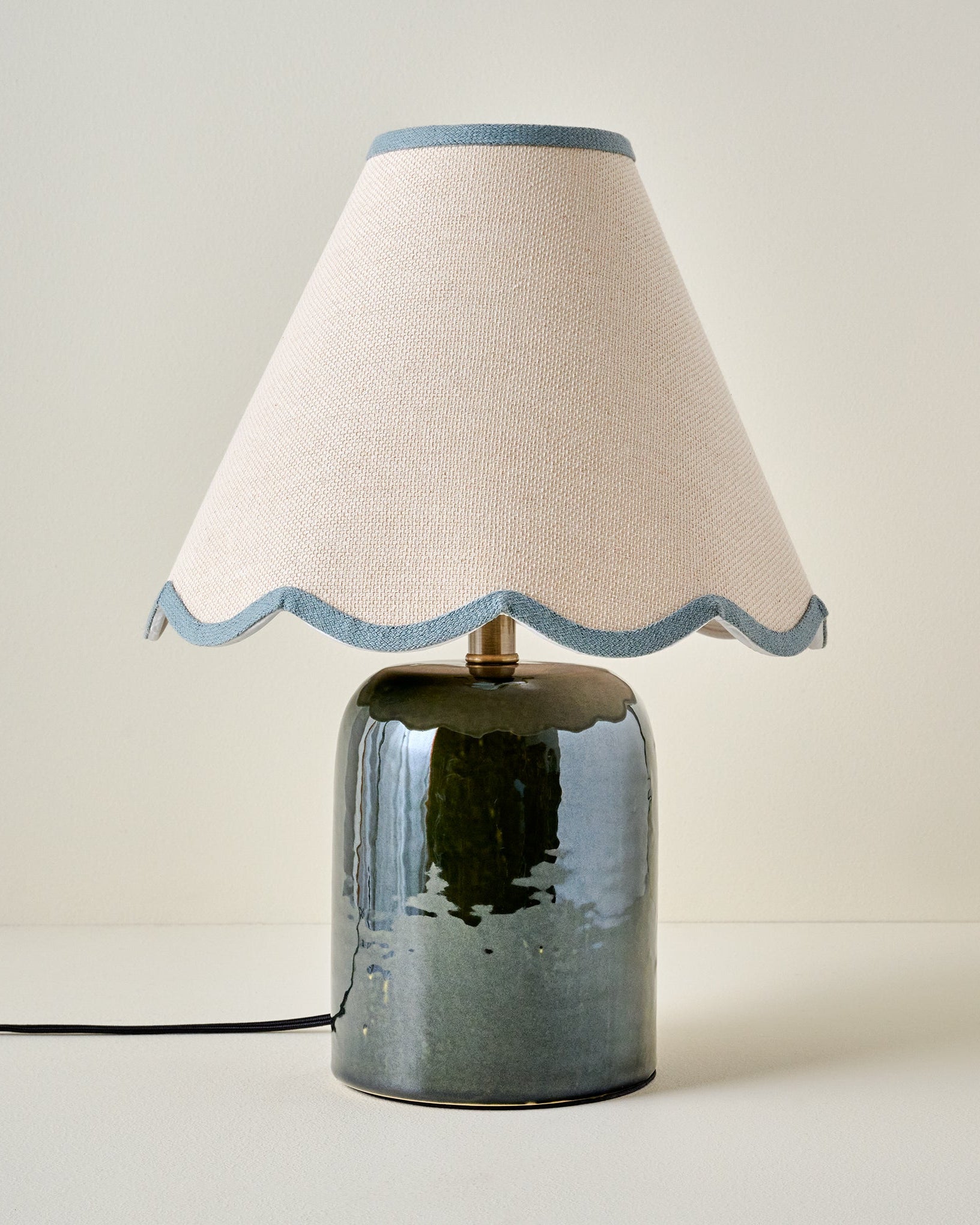 Farrah Table Lamp - Textured Green shown with blue wavy lamp shade