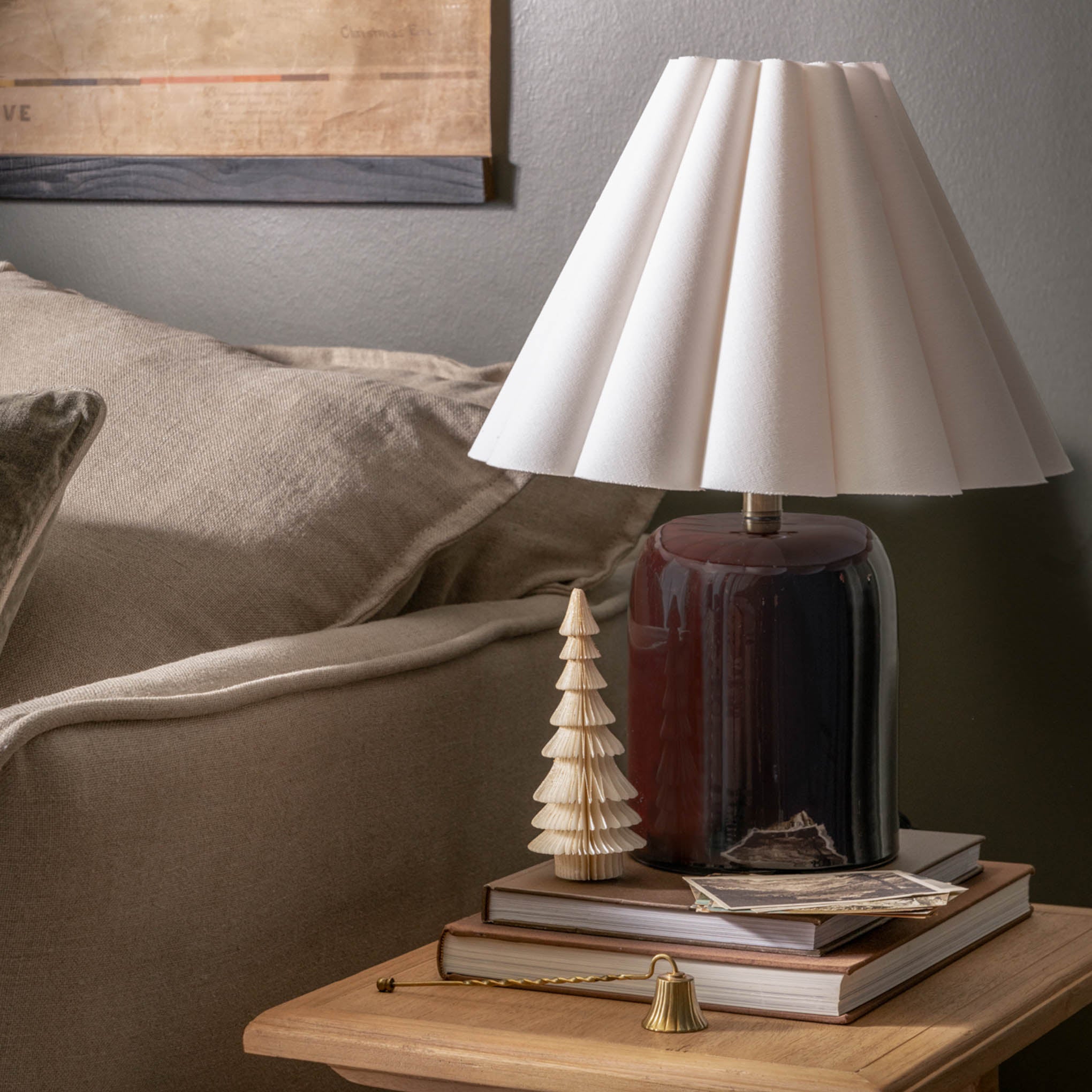 Brass Candle Snuffer on an end table