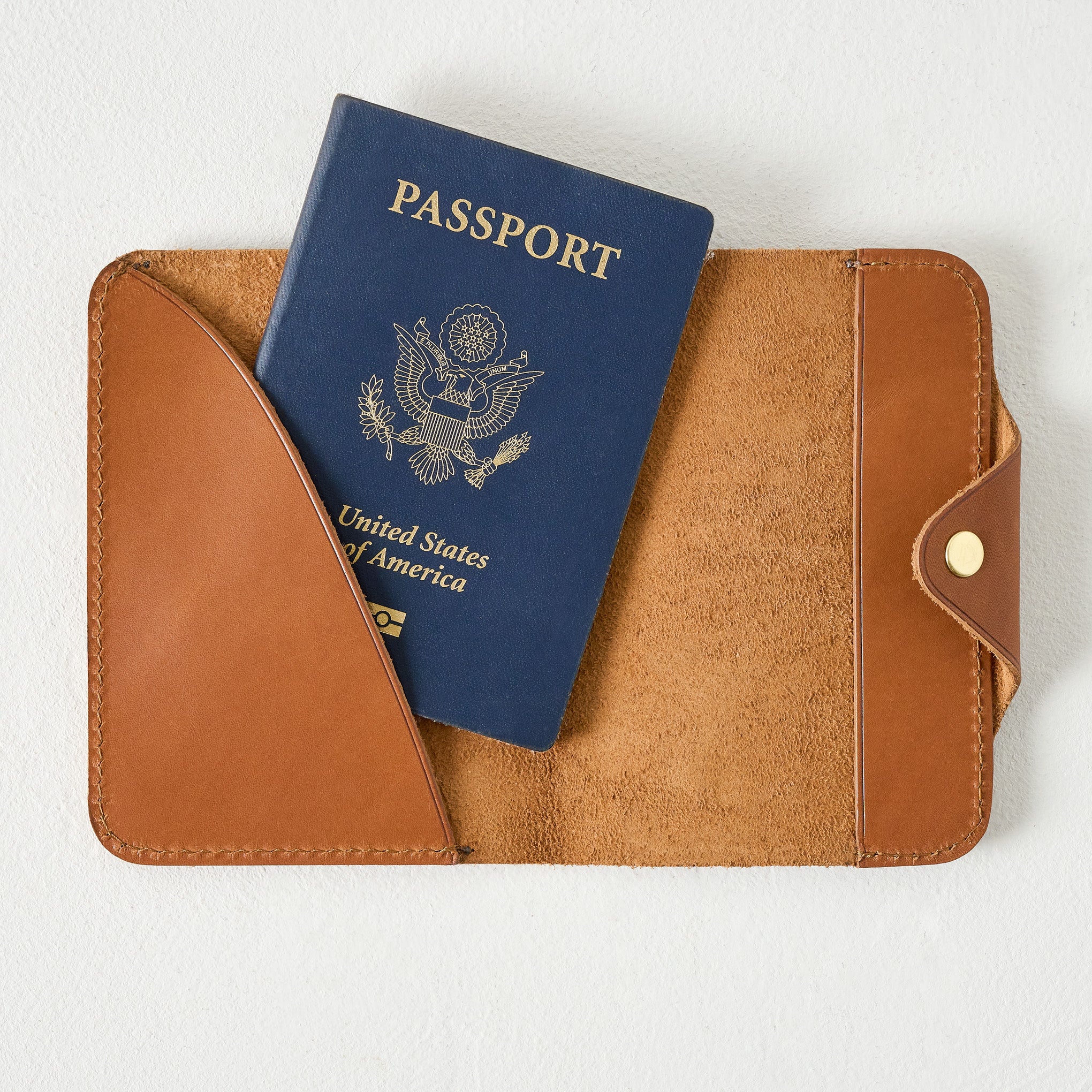 Brown Passport Wallet shown open with passport