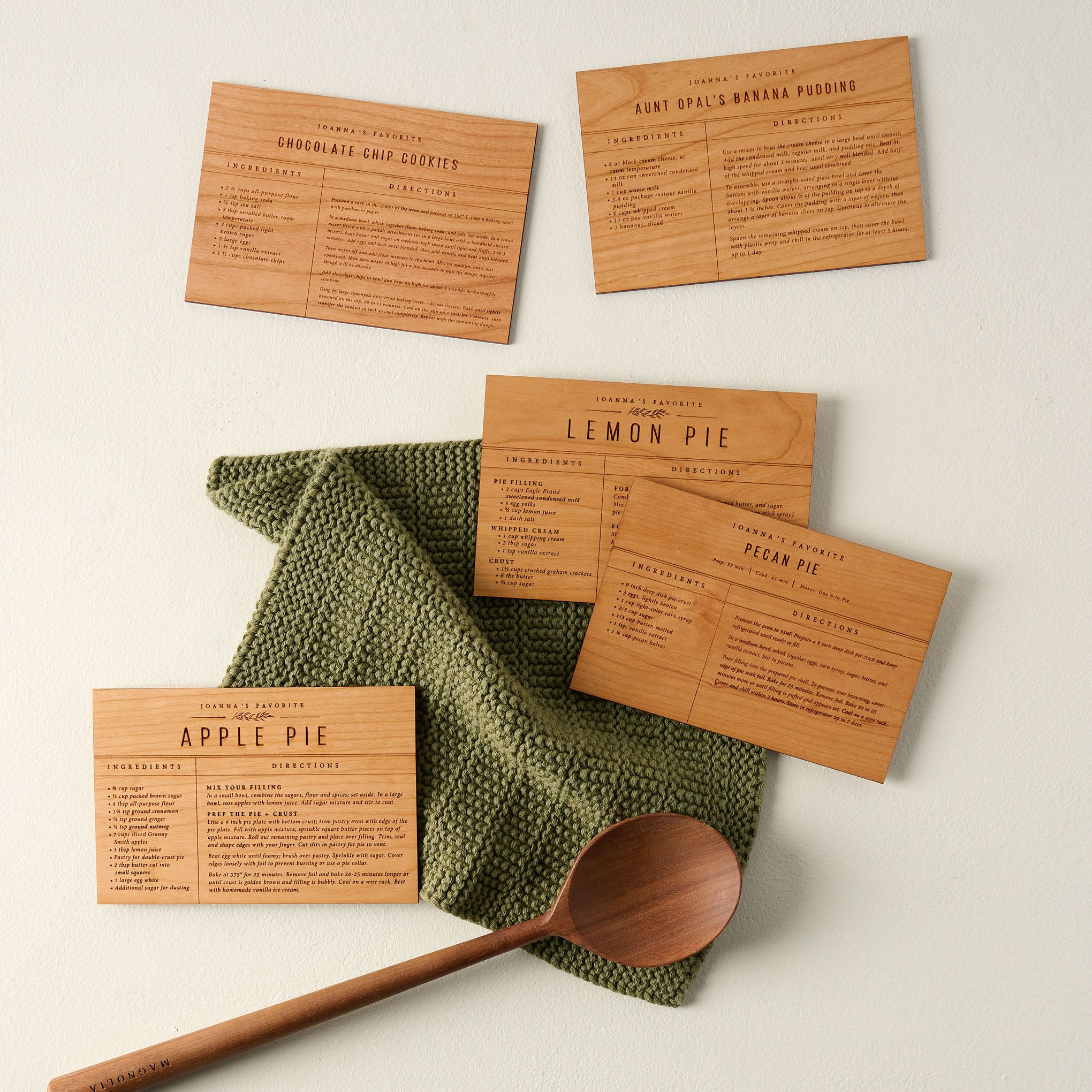 Wooden Recipe Cards all together with a green towel and wooden spoon