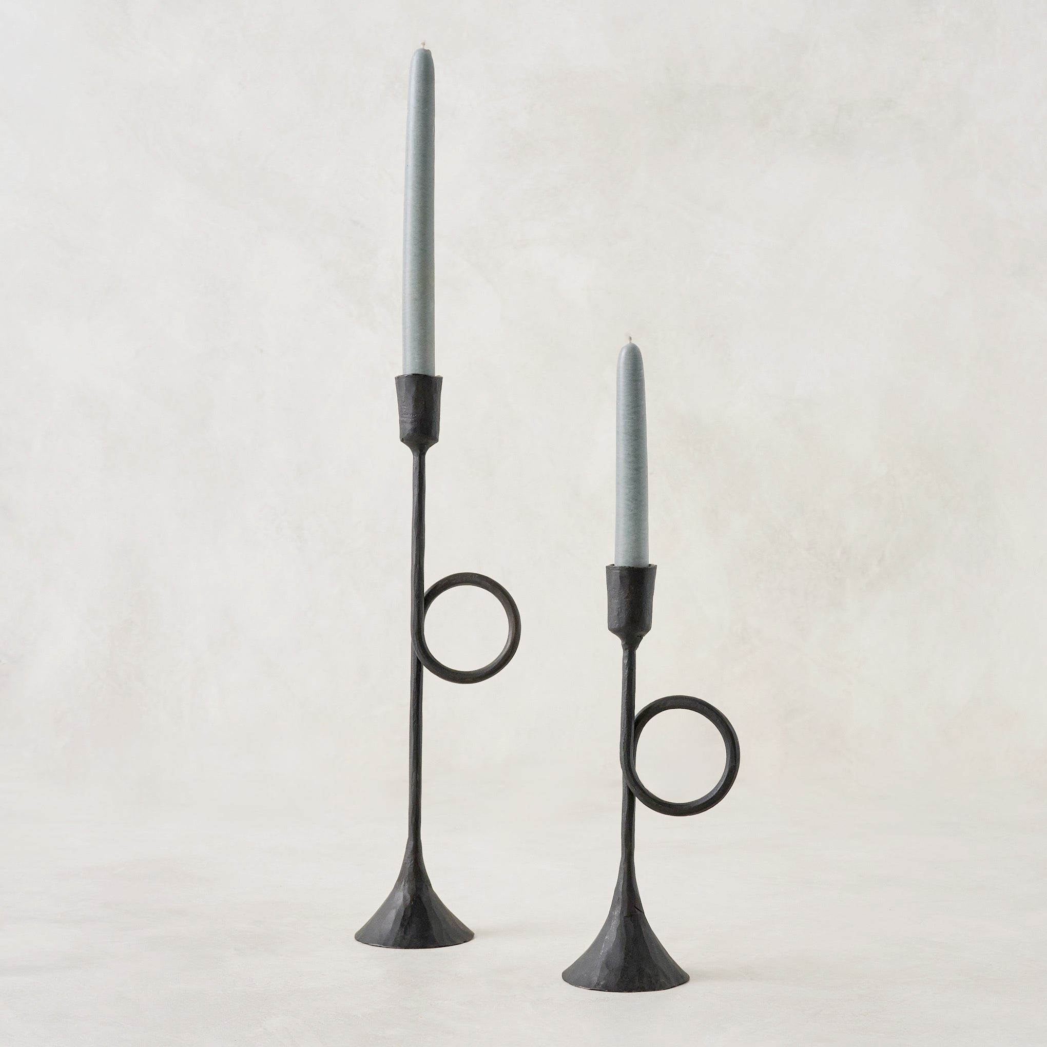 Black Antique Inspired Trumpet Taperholders shown with taper candles