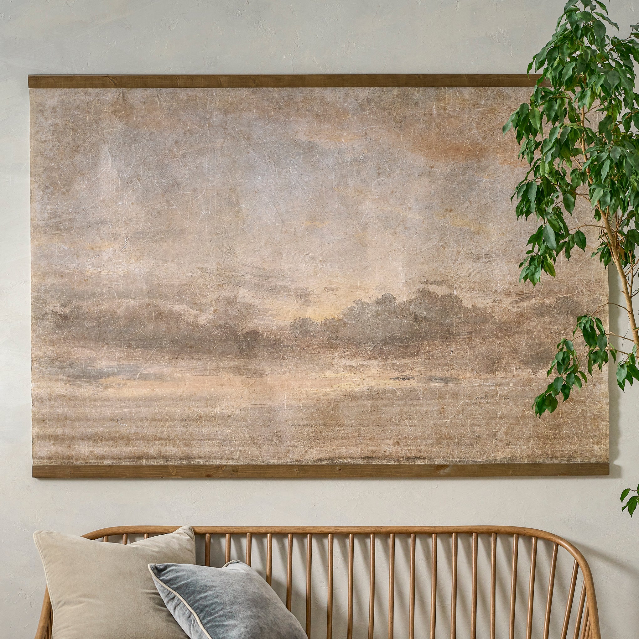 Oversized Celestial Drifts Vintage Tapestry shown hung above bench