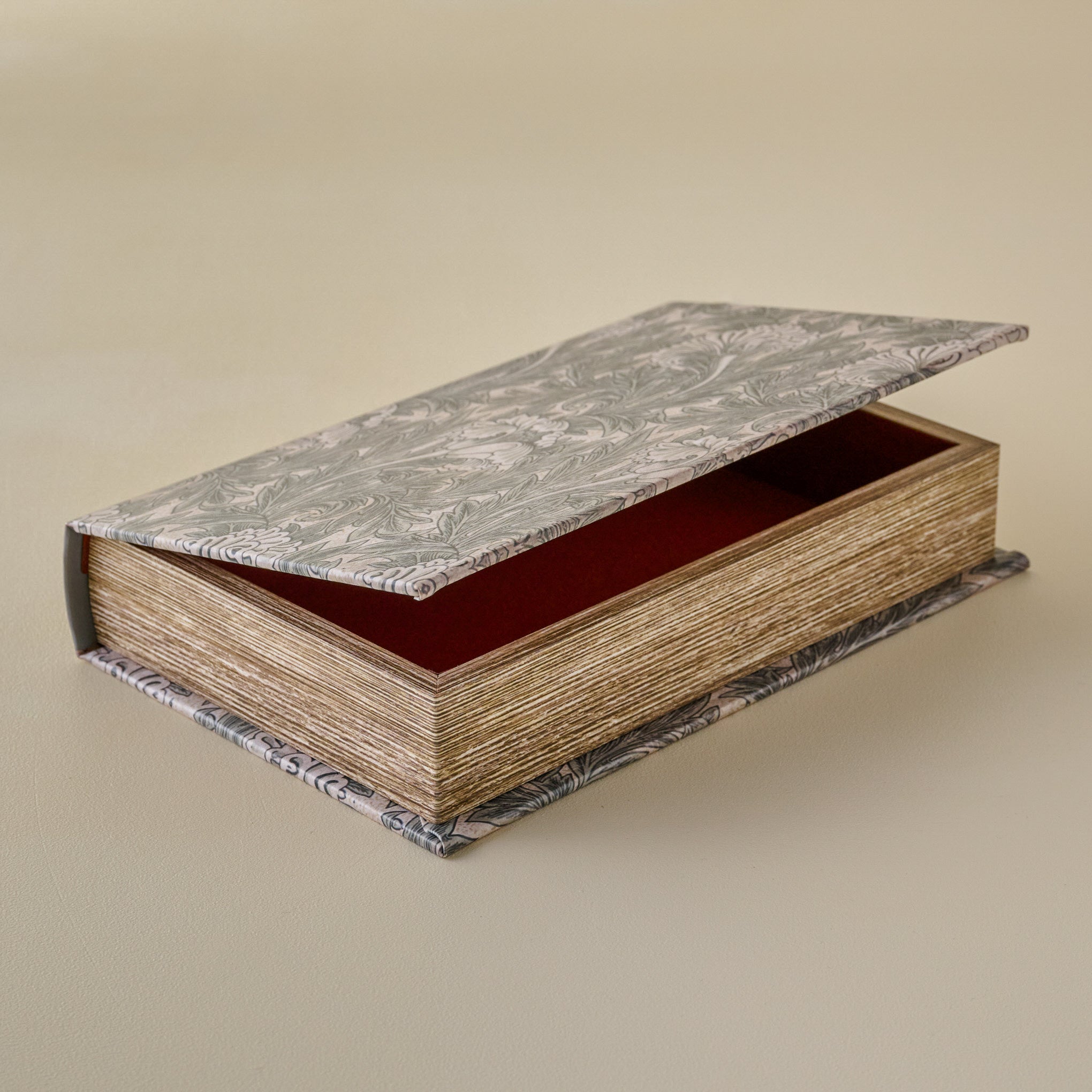 Vintage-Inspired Handcrafted Book Box with floral-patterned lid and base on a beige background