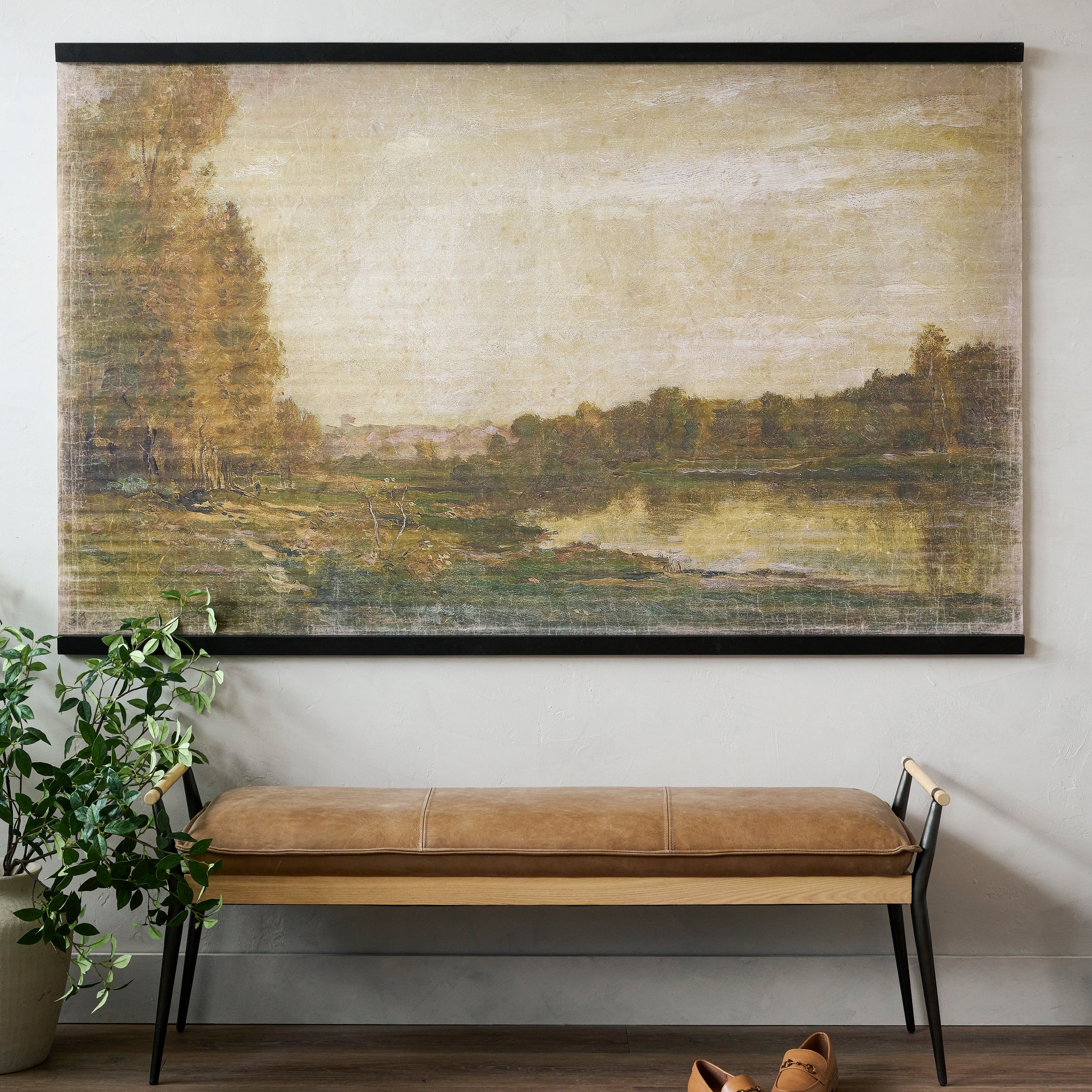 Oversized Vintage Landscape Tapestry hanging above a bench in an entryway