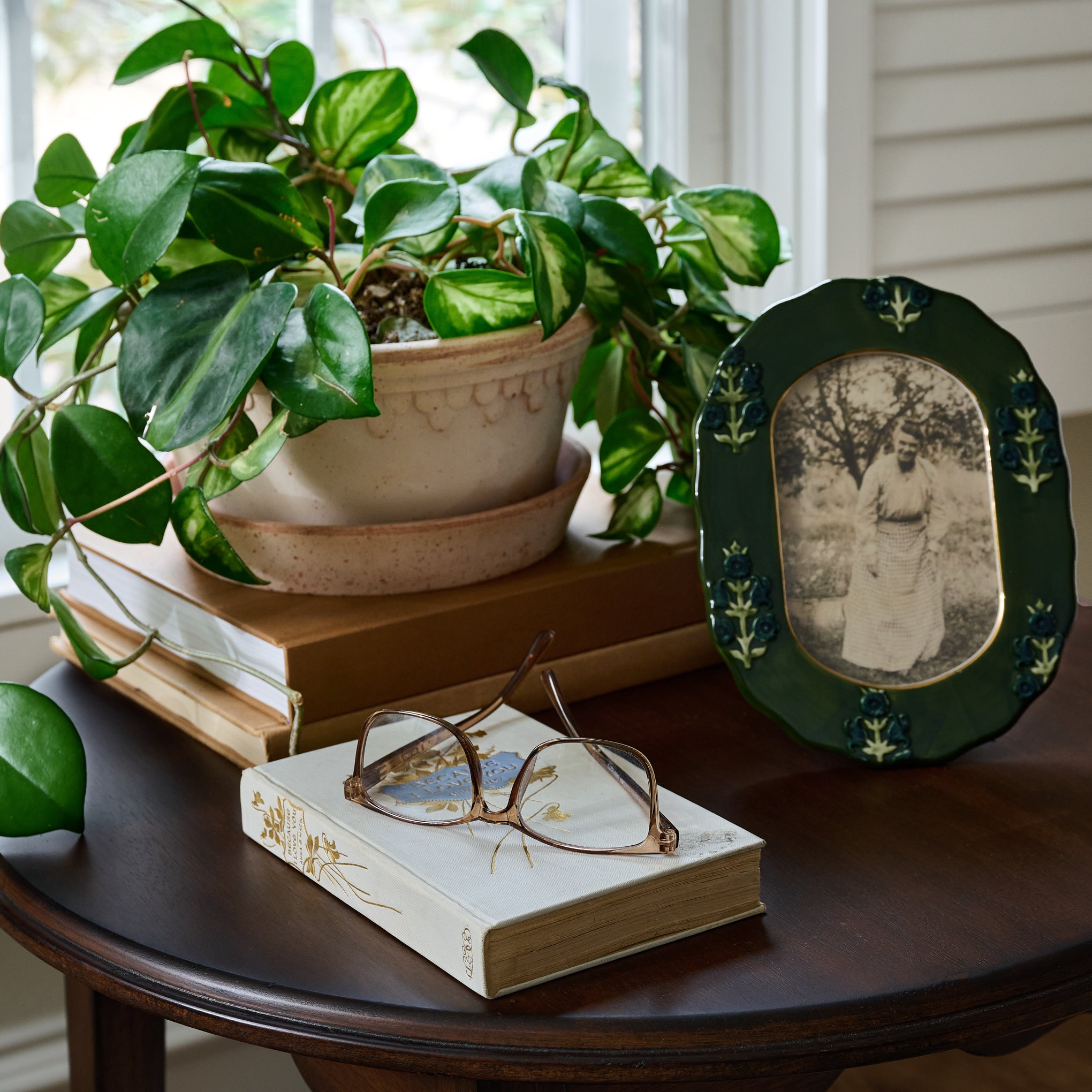 Bergs Københavner Herb Pot & Saucer shown on table with decor