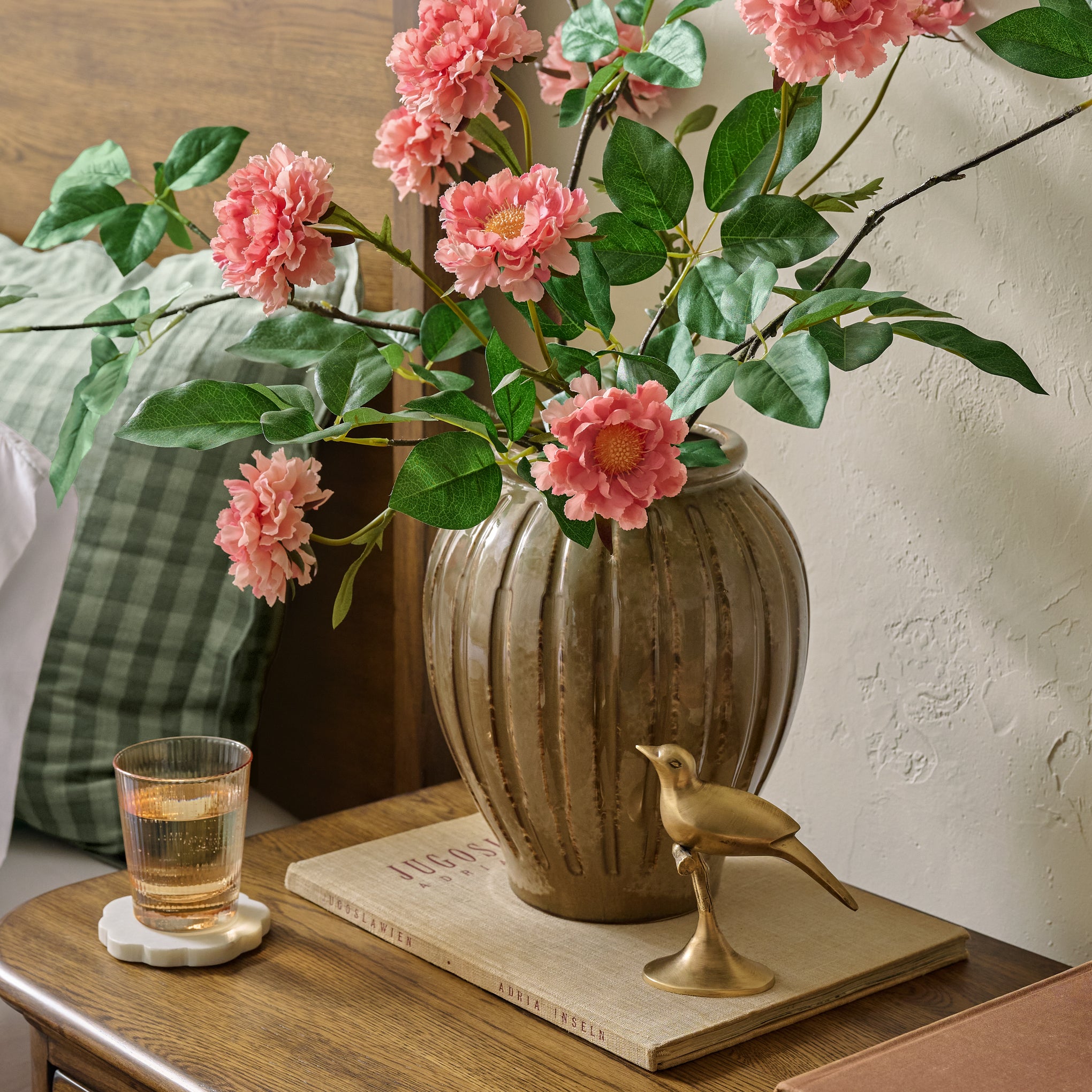 Real Touch Scabiosa Stem shown in vase on nightstand