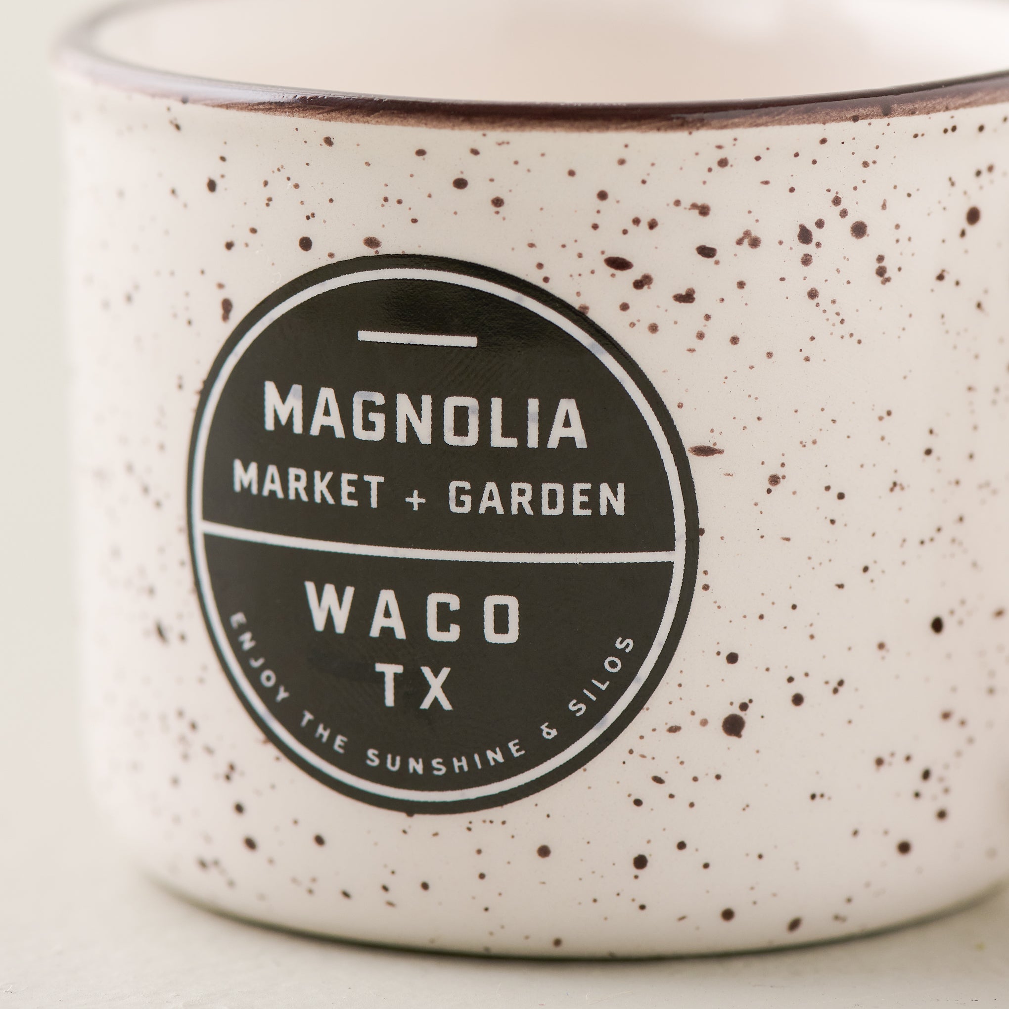 Magnoliass Campfire Mug Ornament close up of logo on mug