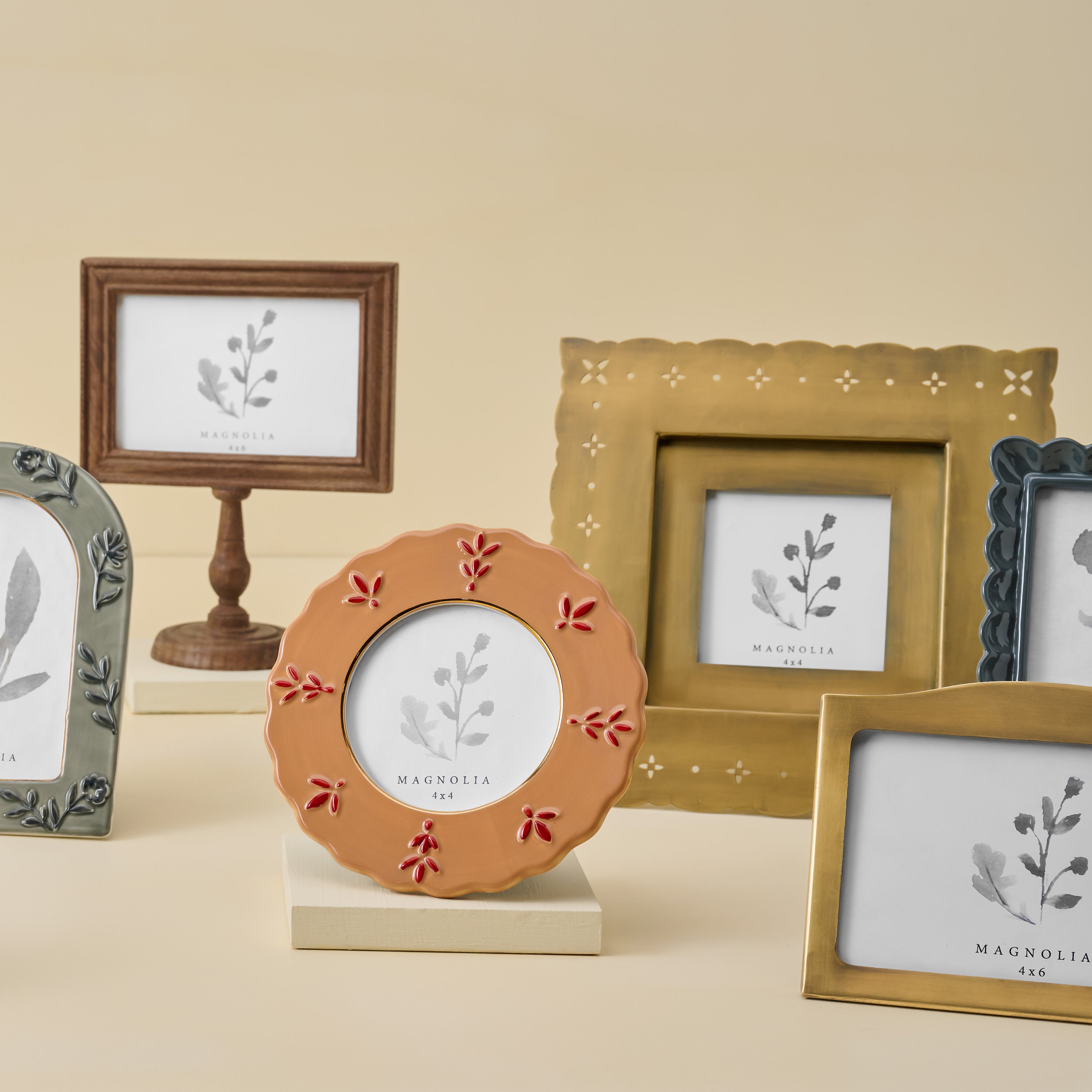 Rustic clay Round Ceramic Juliet Photo Frame shown with other frames