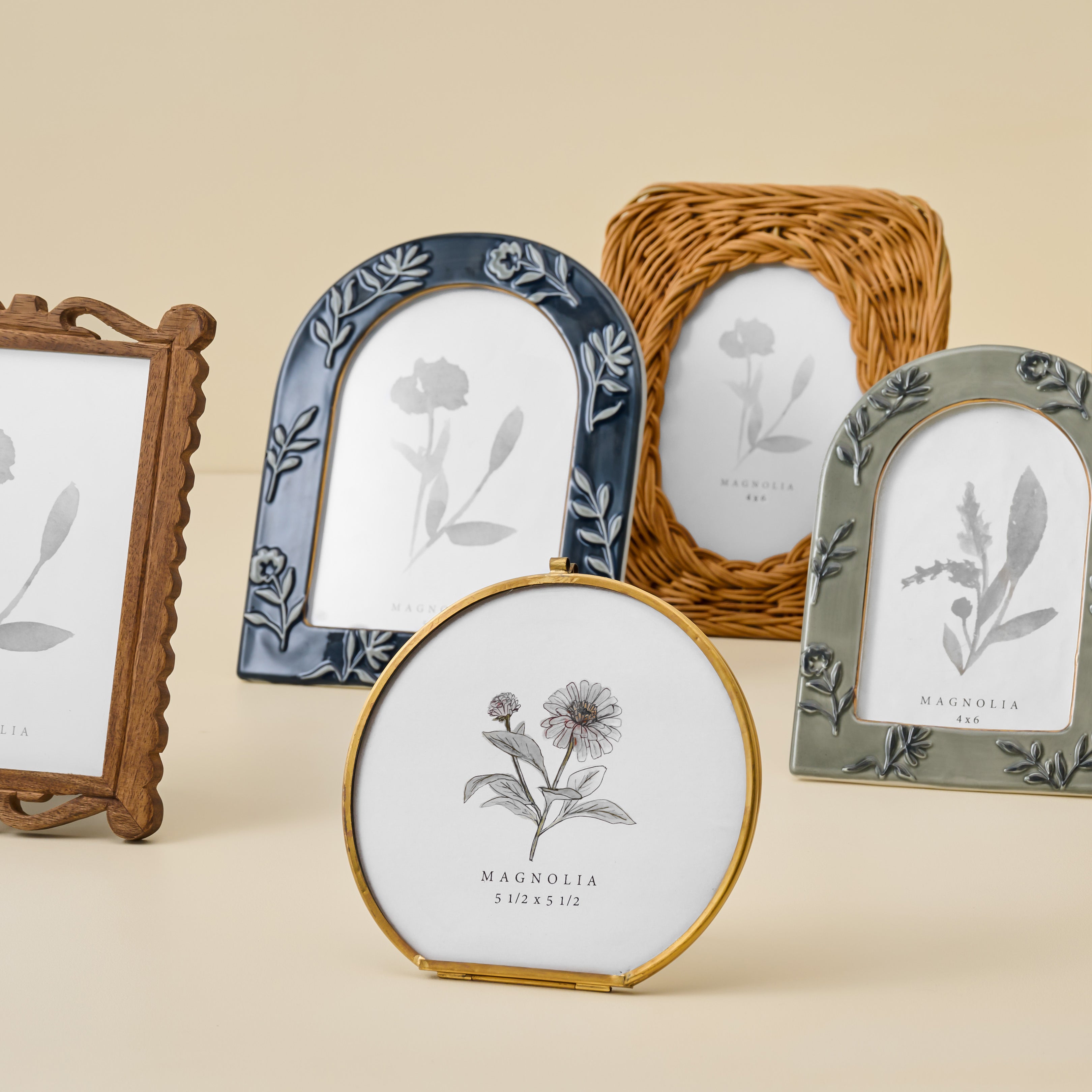 Ceramic Arched Floral Photo Frame shown with other frames