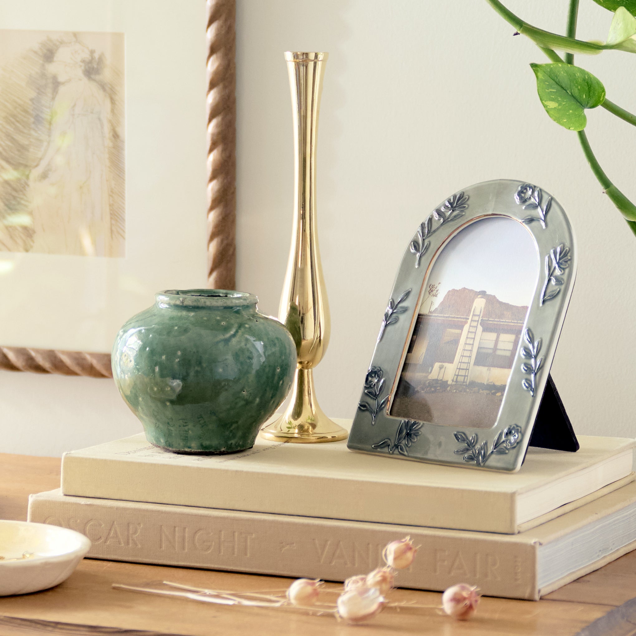4x6 Ceramic Arched Floral Photo Frame shown with other decor
