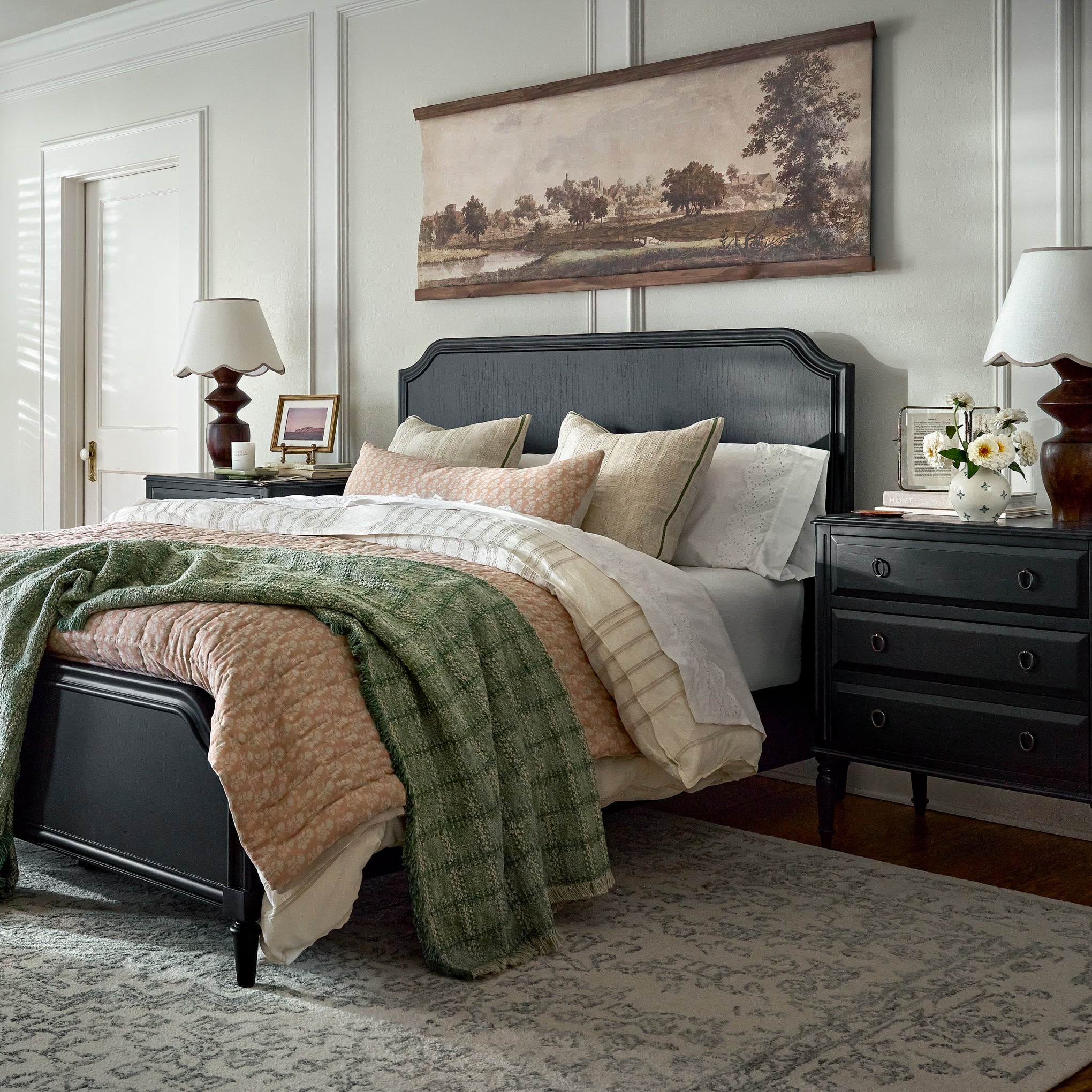 European Countryside Tapestry shown hung above bed