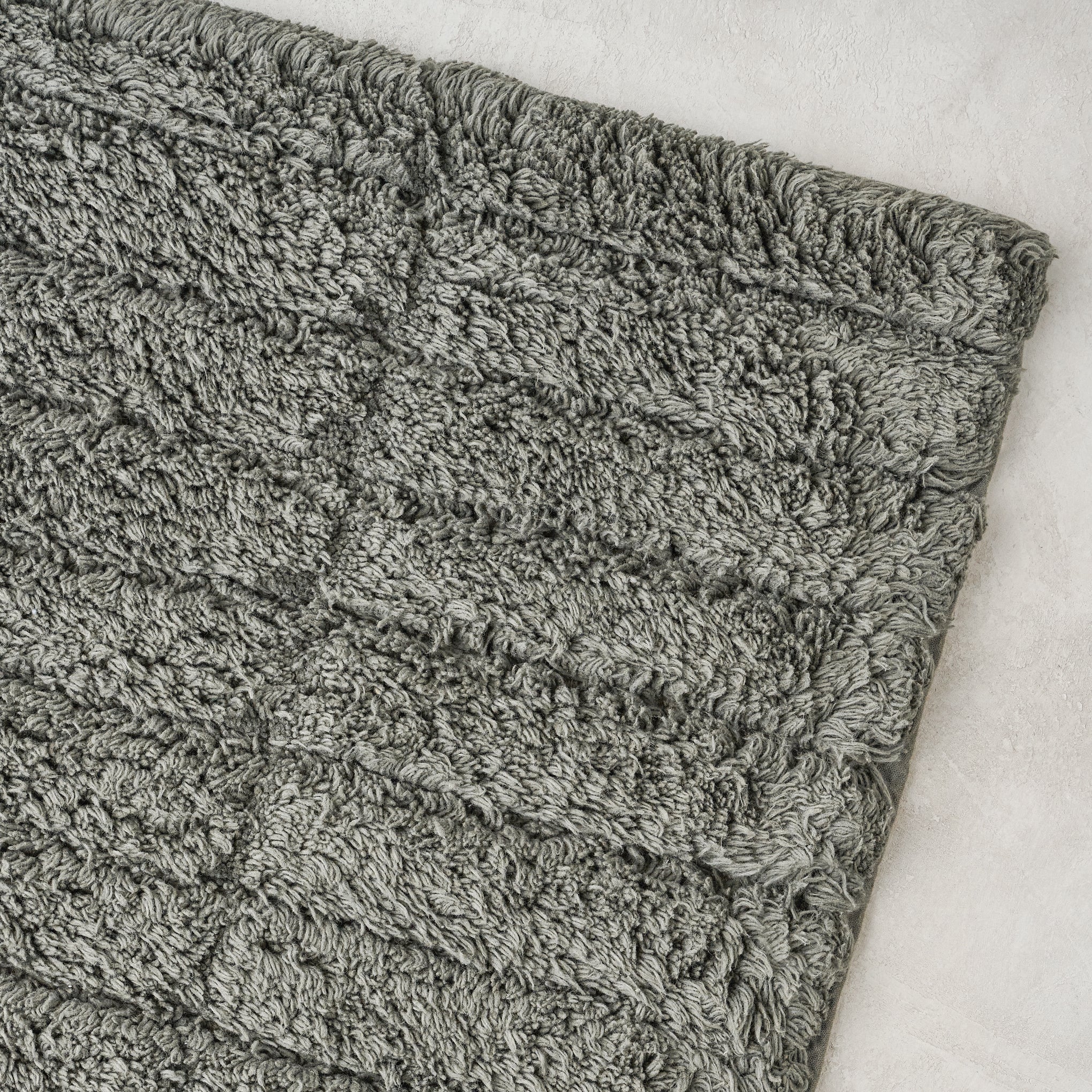 close up detail view of Olive Green Zone Bath Mat